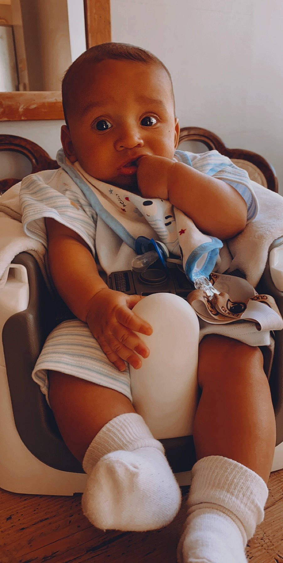 Manny is registered to the contest to win money with this photo: abdomen, baby, cheek, child, knee, leg, person, sitting, thigh, toddler