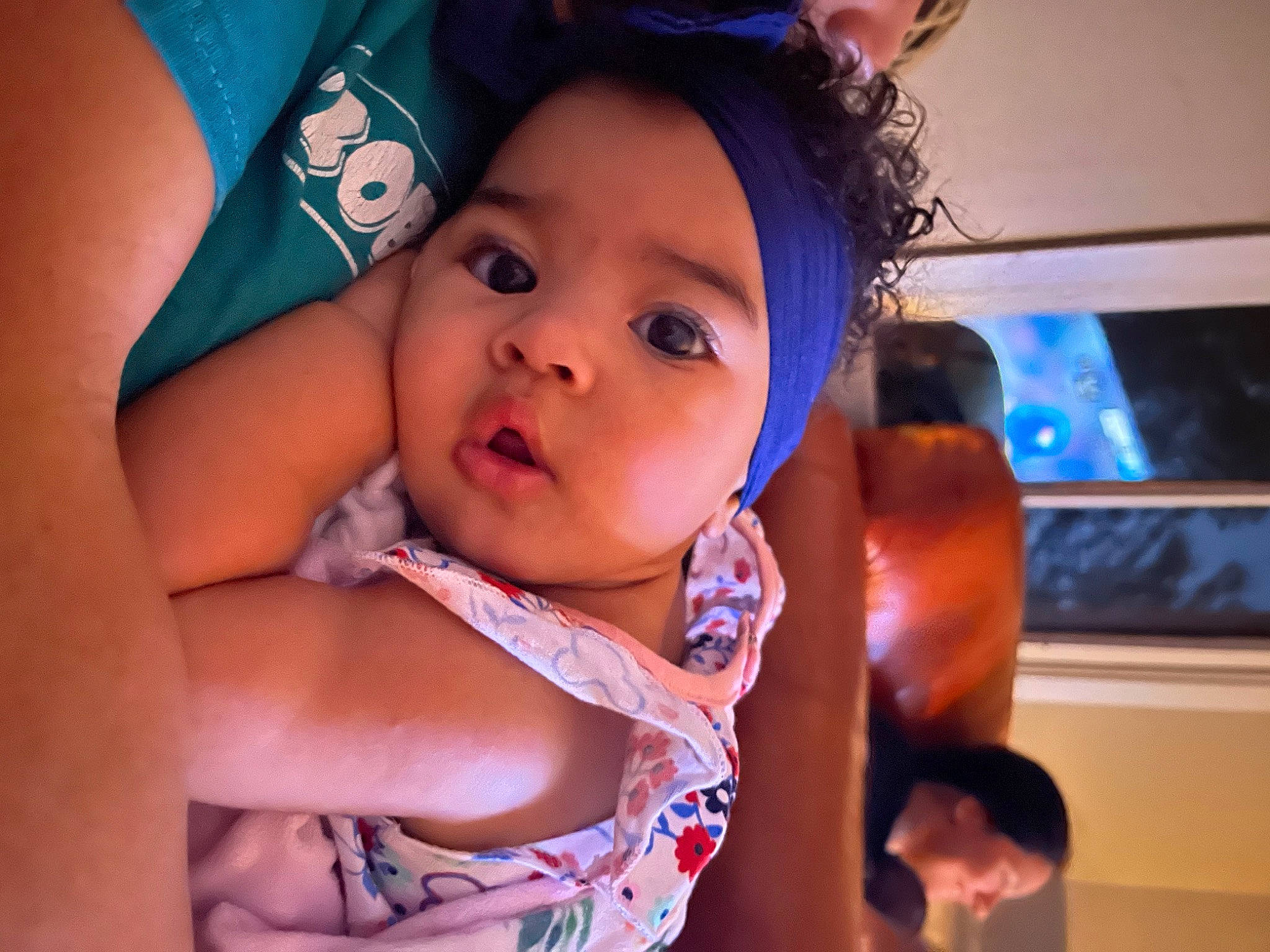 Alana is registered to the contest to win money with this photo: baby, black_hair, blue, child, chin, close_up, eye, eyebrow, eyelash, flash_photography, fun, gesture, happy, iris, leisure, lip, mouth, nose, person, skin