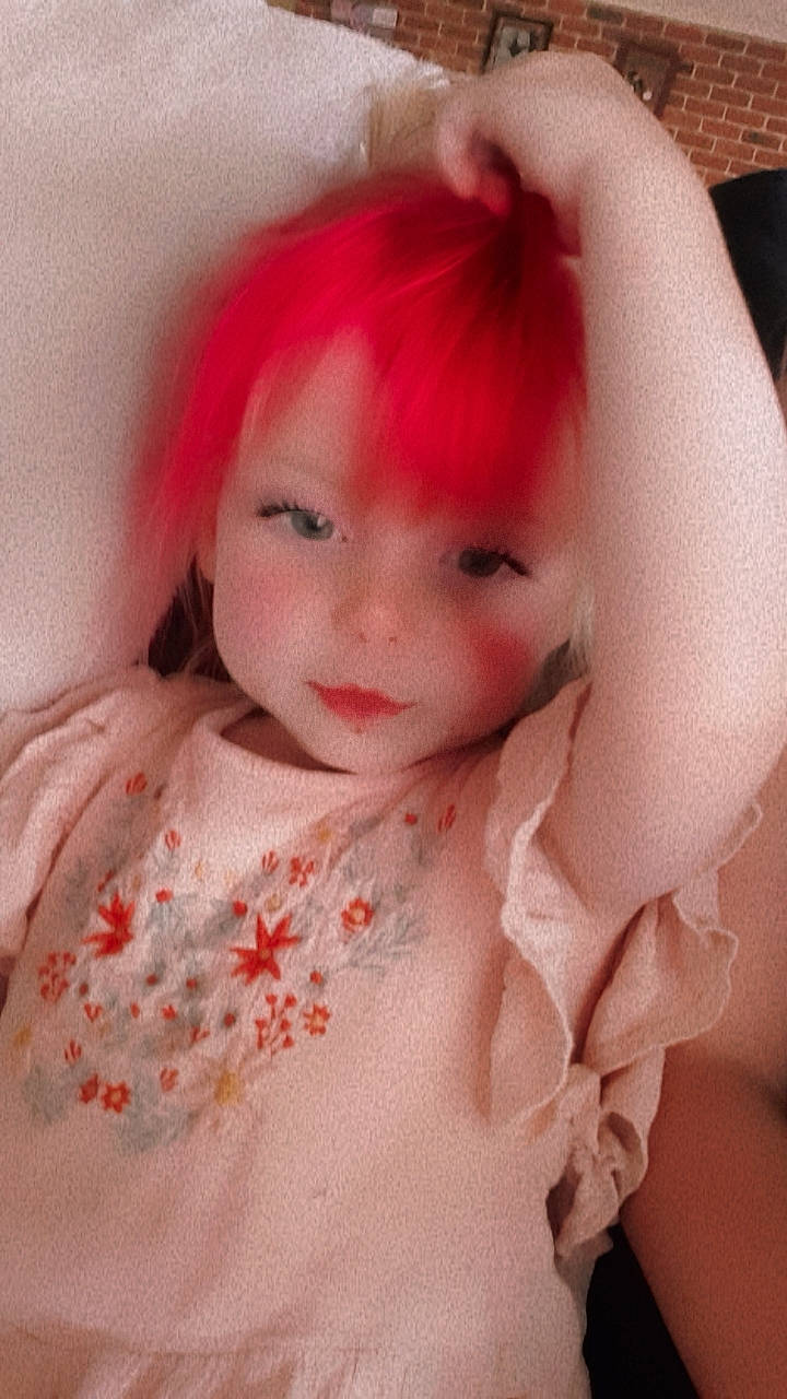 Addison is registered to the contest to win money with this photo: bangs, beauty, dress, eye, eyelash, happy, hime_cut, iris, layered_hair, lip, long_hair, neck, outerwear, peach, person, petal, pink, sleeve, smile, textile