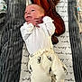 Mateo joined the competition — help win amazing prizes! baby, newborn, infant, onesie, printed_pants, crib, blanket, bedding, grey_blanket, penguin_pattern, striped_jacket, white_clothing, hands_near_face, head, face, lying_down, looking_up, cute, cozy, top_view