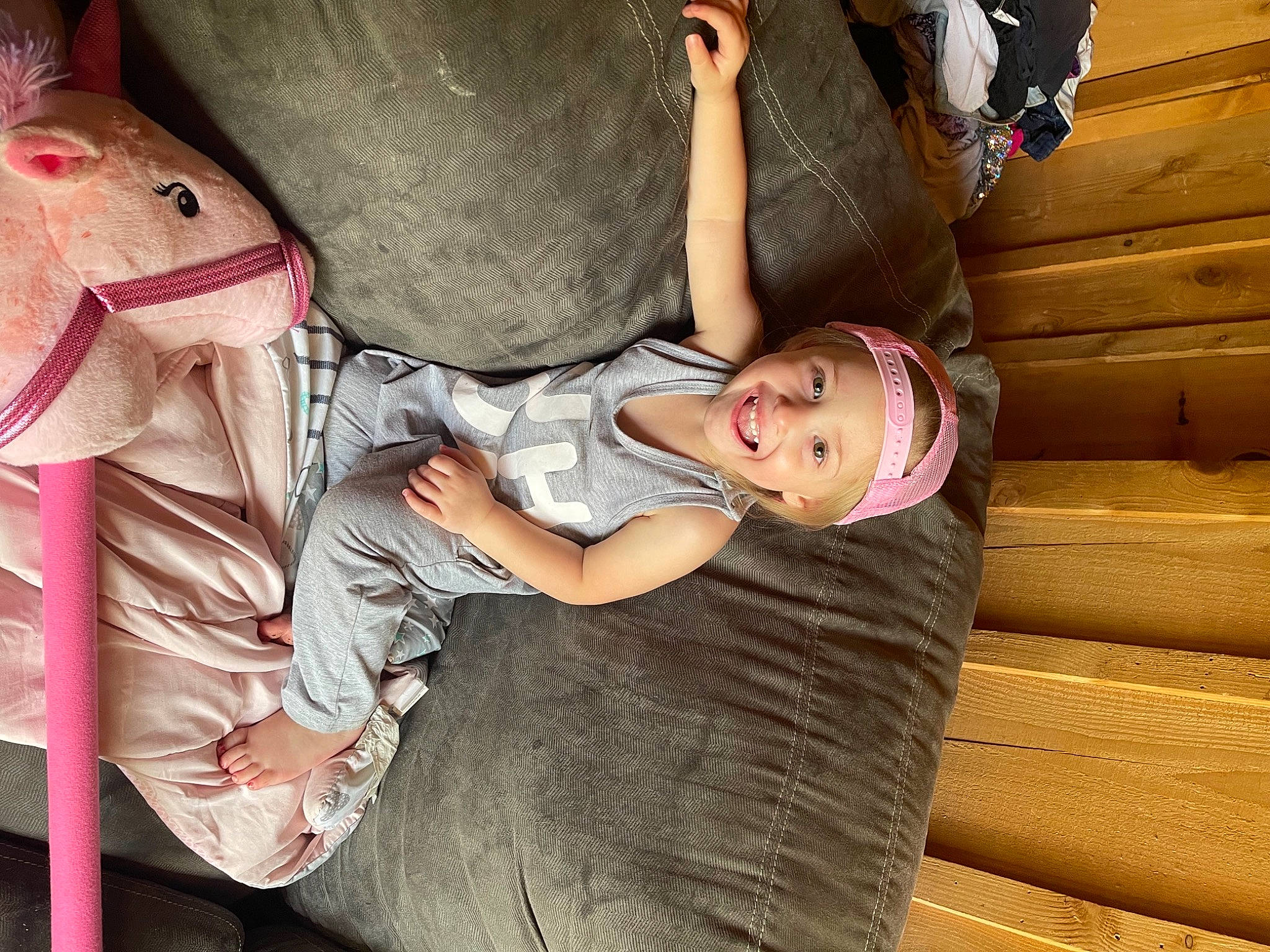 Aryah joined the competition — help win amazing prizes! arm, baby, baby_carriage, baby_products, child, comfort, couch, finger, fun, headwear, joy, lap, leg, mouth, person, pink, shoe, sitting, skin, thigh