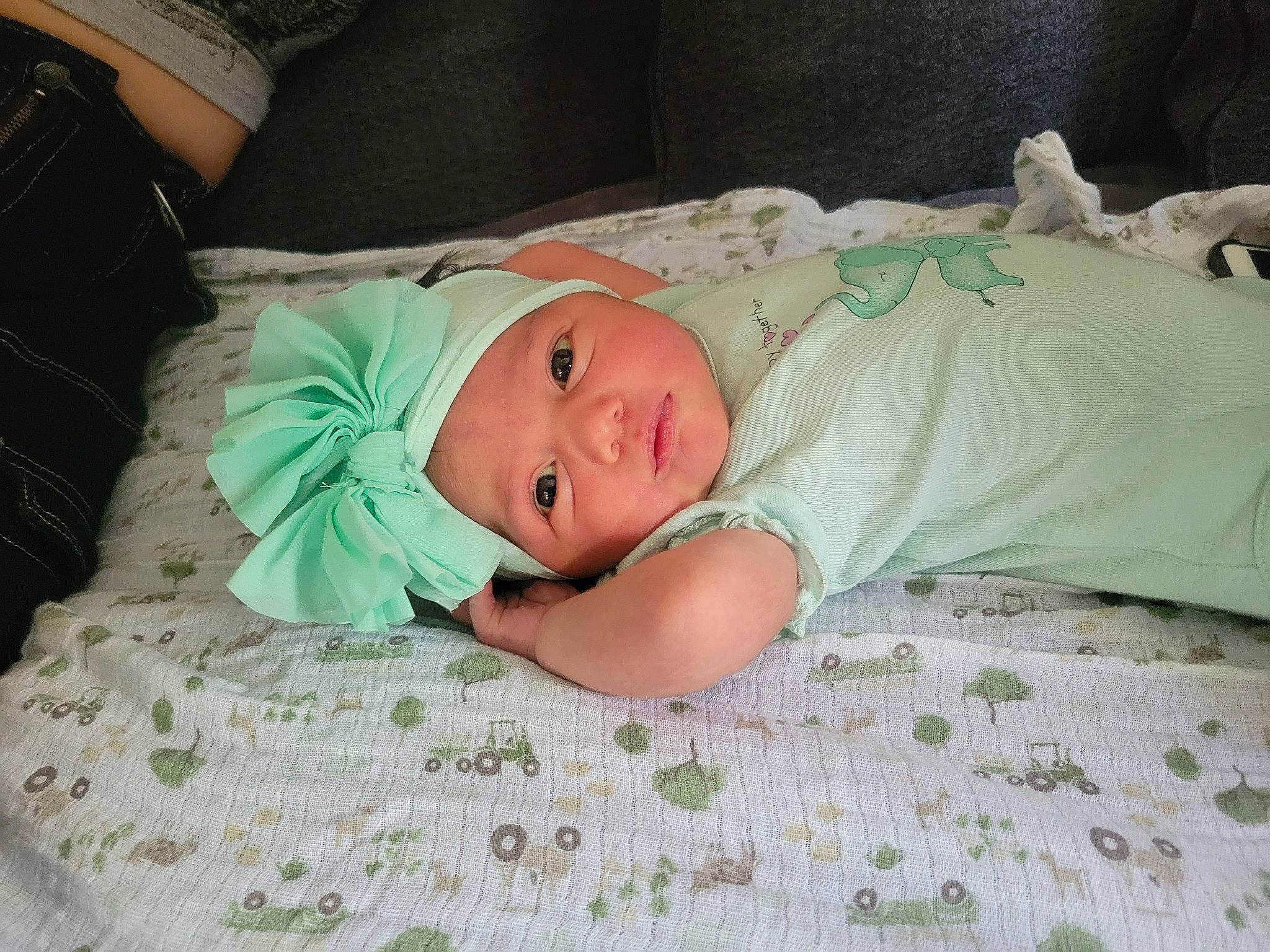 Gloria is registered to the contest to win money with this photo: baby, baby_products, baby_safety, baby_toddler_clothing, bed, bedding, bedtime, child, comfort, event, eye, face, grass, hand, head, headwear, linens, nap, person, room