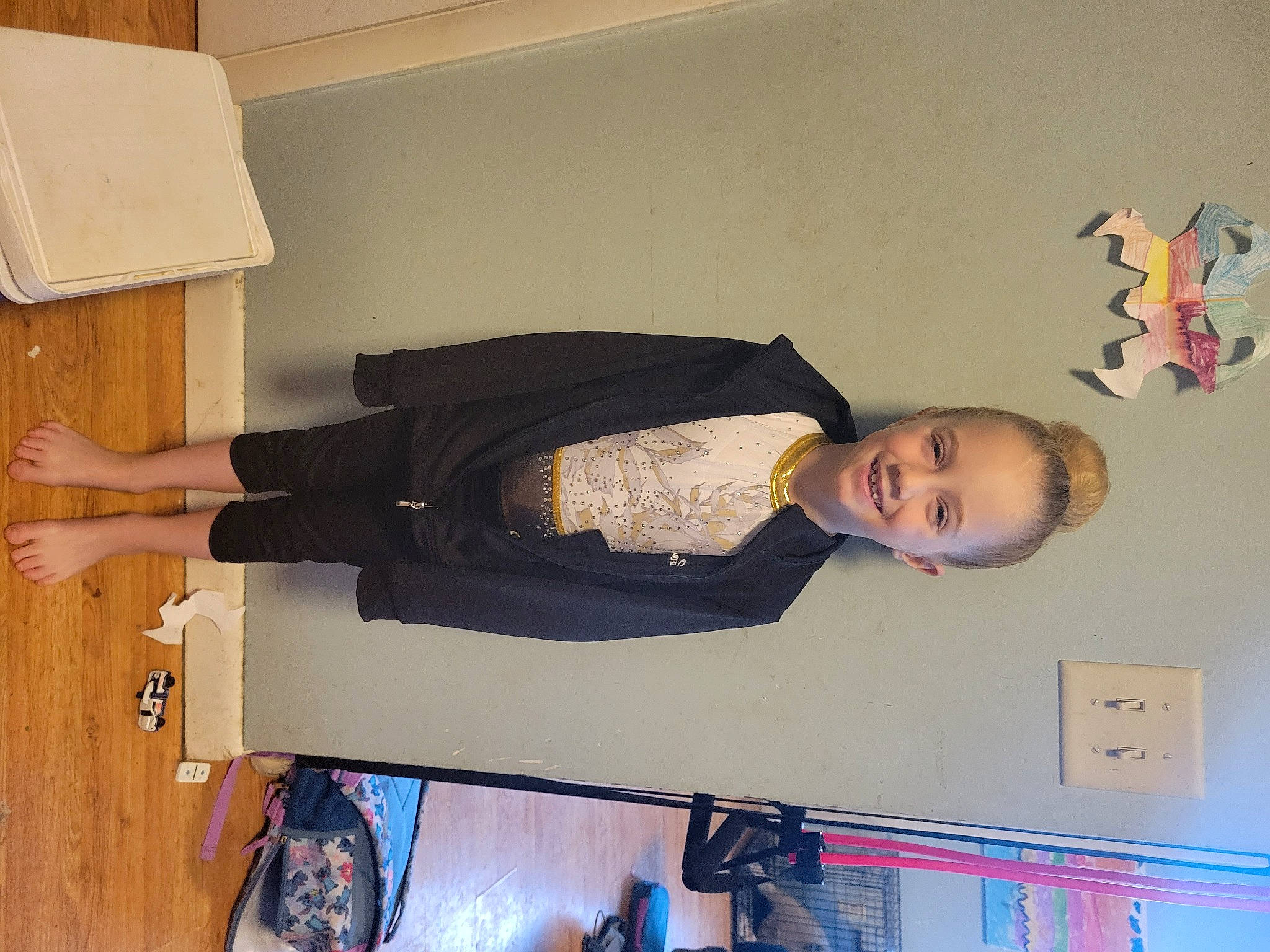 Lorelei joined the competition — help win amazing prizes! balance, comfort, elbow, flooring, foot, fun, gesture, hardwood, human_leg, joy, knee, light_switch, person, room, suit, television, thigh, varnish, waist, wood