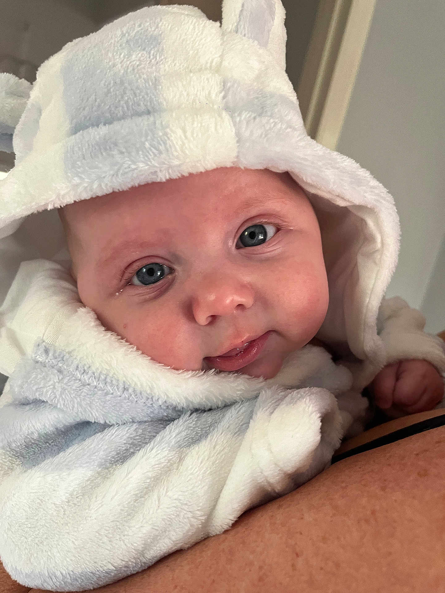 Luca joined the competition — help win amazing prizes! baby, infant, face, blue_eyes, hood, fluffy_clothing, cute, portrait, close_up, child, soft_texture, skin, human, person, newborn, baby_clothes, expression, looking_at_camera, indoor, holding