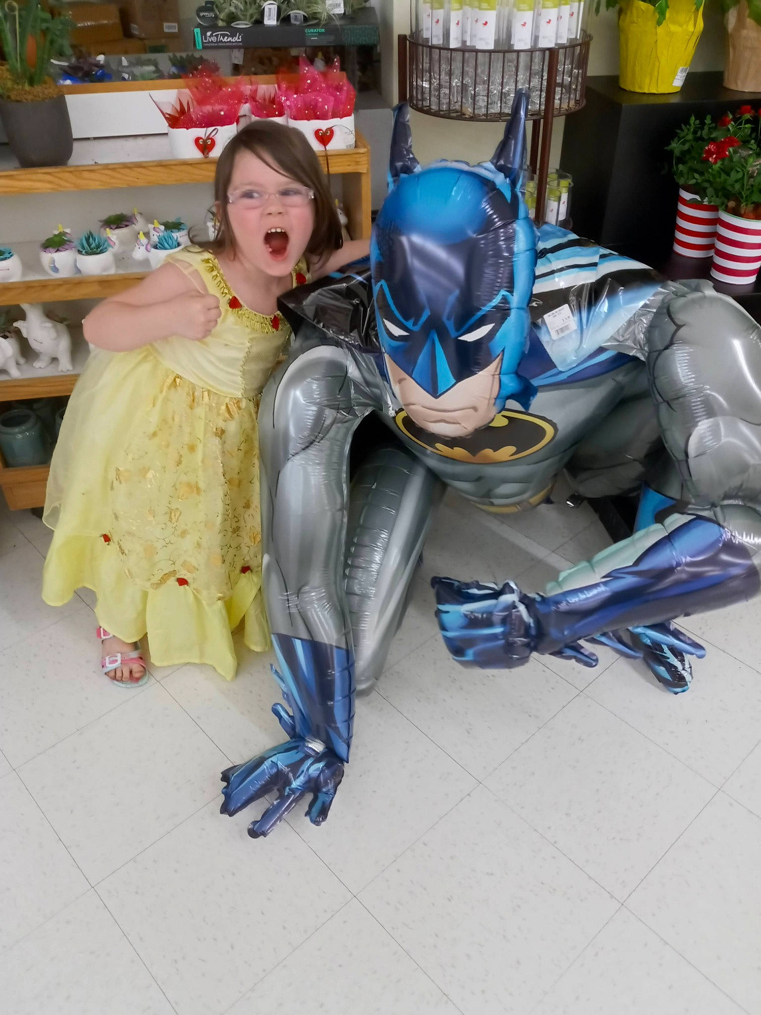 Sierra joined the competition — help win amazing prizes! action_figure, animated_cartoon, armour, blue, carmine, chair, costume, electric_blue, event, fashion_design, fiction, fictional_character, figurine, houseplant, justice_league, machine, person, plastic, purple, toy