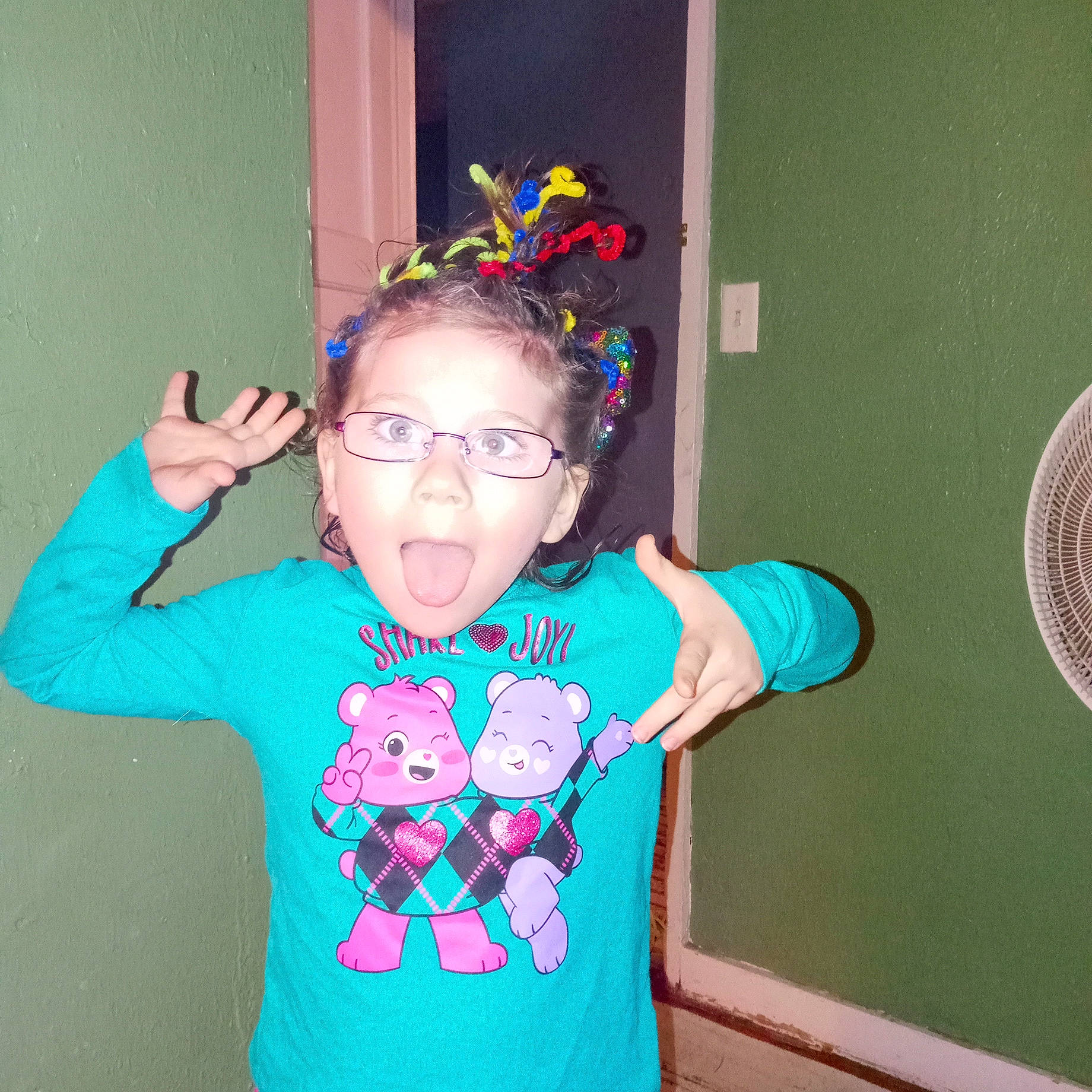 Sierra joined the competition — help win amazing prizes! baby_toddler_clothing, child, circle, costume, electric_blue, eyewear, fashion_accessory, fun, gesture, happy, holiday, magenta, party_supply, pattern, person, pink, sleeve, surprise, t_shirt, toddler