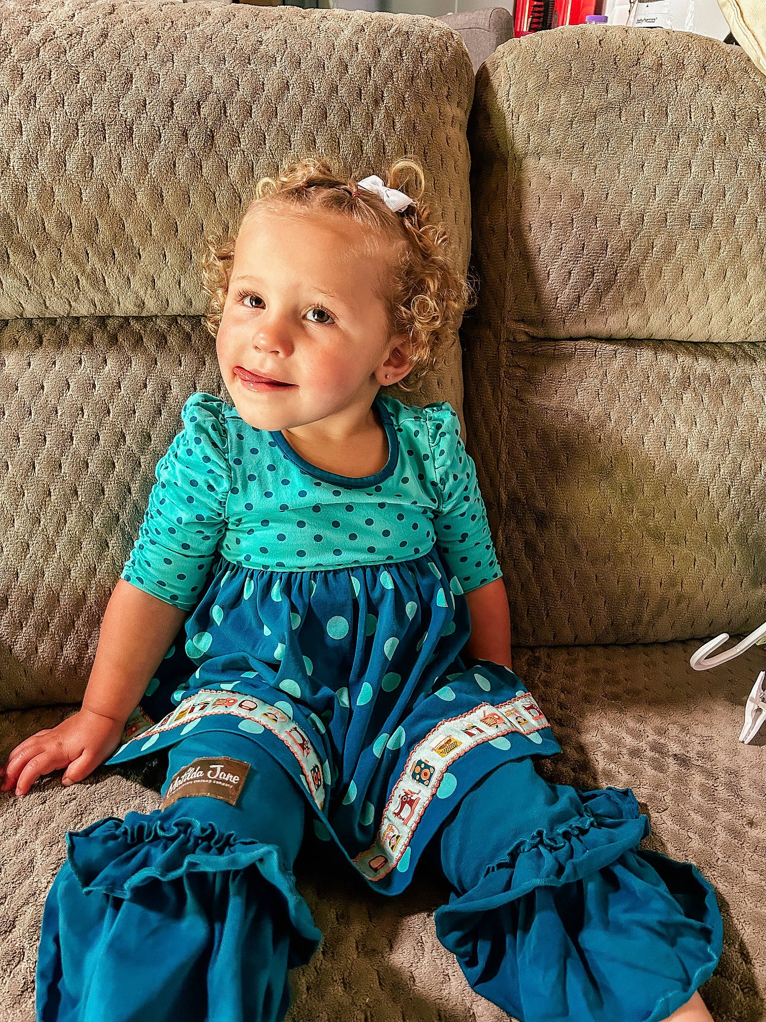Amiyah joined the competition — help win amazing prizes! azure, baby_toddler_clothing, blue, child, couch, dress, eye, face, facial_expression, grass, happy, head, human_body, joy, neck, person, shoulder, skin, sleeve, smile
