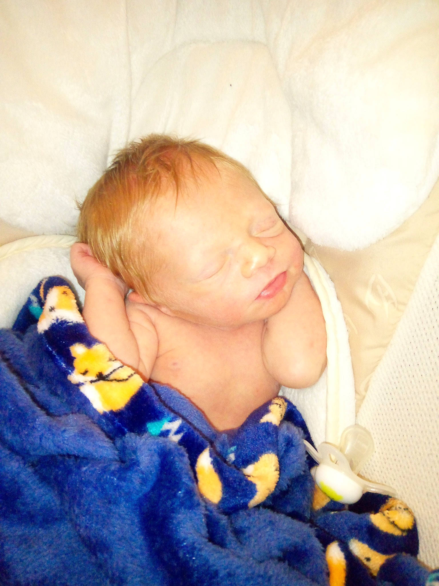 Dior is registered to the contest to win money with this photo: baby, baby_sleeping, baby_toddler_clothing, bedtime, cheek, child, comfort, electric_blue, finger, iris, linens, mouth, nap, nose, orange, pattern, person, skin, sleeve, textile