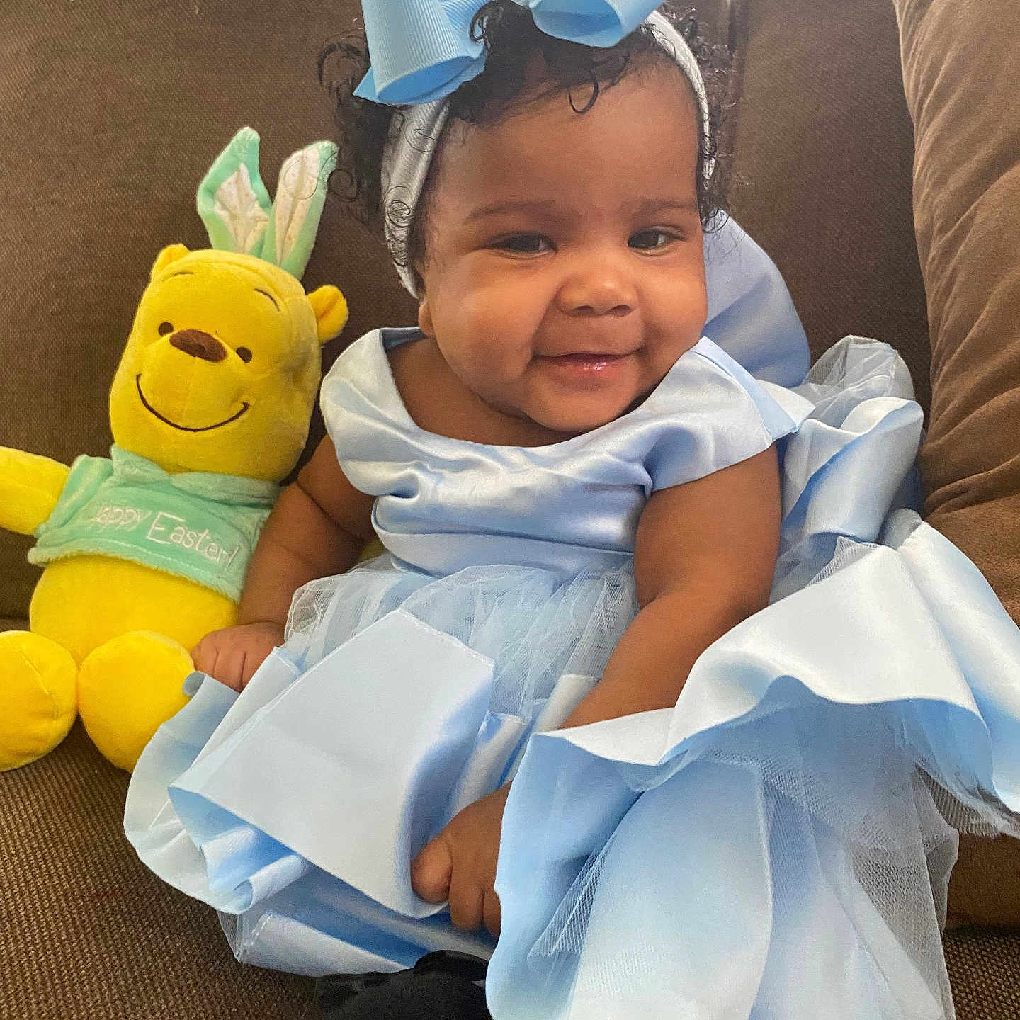 December joined the competition — help win amazing prizes! baby, ball, clothing, costume, couch, cushion, dress, face, football, furniture, happy, head, homedecor, person, photography, portrait, sitting, smile, soccer, toy
