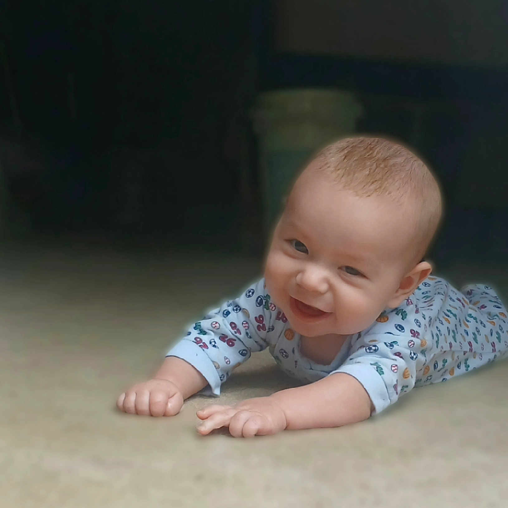 Espn joined the competition — help win amazing prizes! baby, cheerful, child, cozy, cute, expression, face, floor, hand, happy, head, indoor, infant, lying_down, onesie, patterned_clothing, portrait, skin, smile, young_child