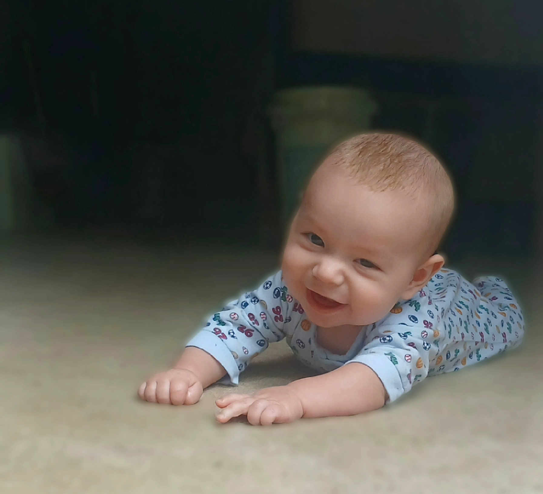 Espn joined the competition — help win amazing prizes! baby, cheerful, child, cozy, cute, expression, face, floor, hand, happy, head, indoor, infant, lying_down, onesie, patterned_clothing, portrait, skin, smile, young_child