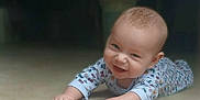 Espn joined the competition — help win amazing prizes! baby, cheerful, child, cozy, cute, expression, face, floor, hand, happy, head, indoor, infant, lying_down, onesie, patterned_clothing, portrait, skin, smile, young_child