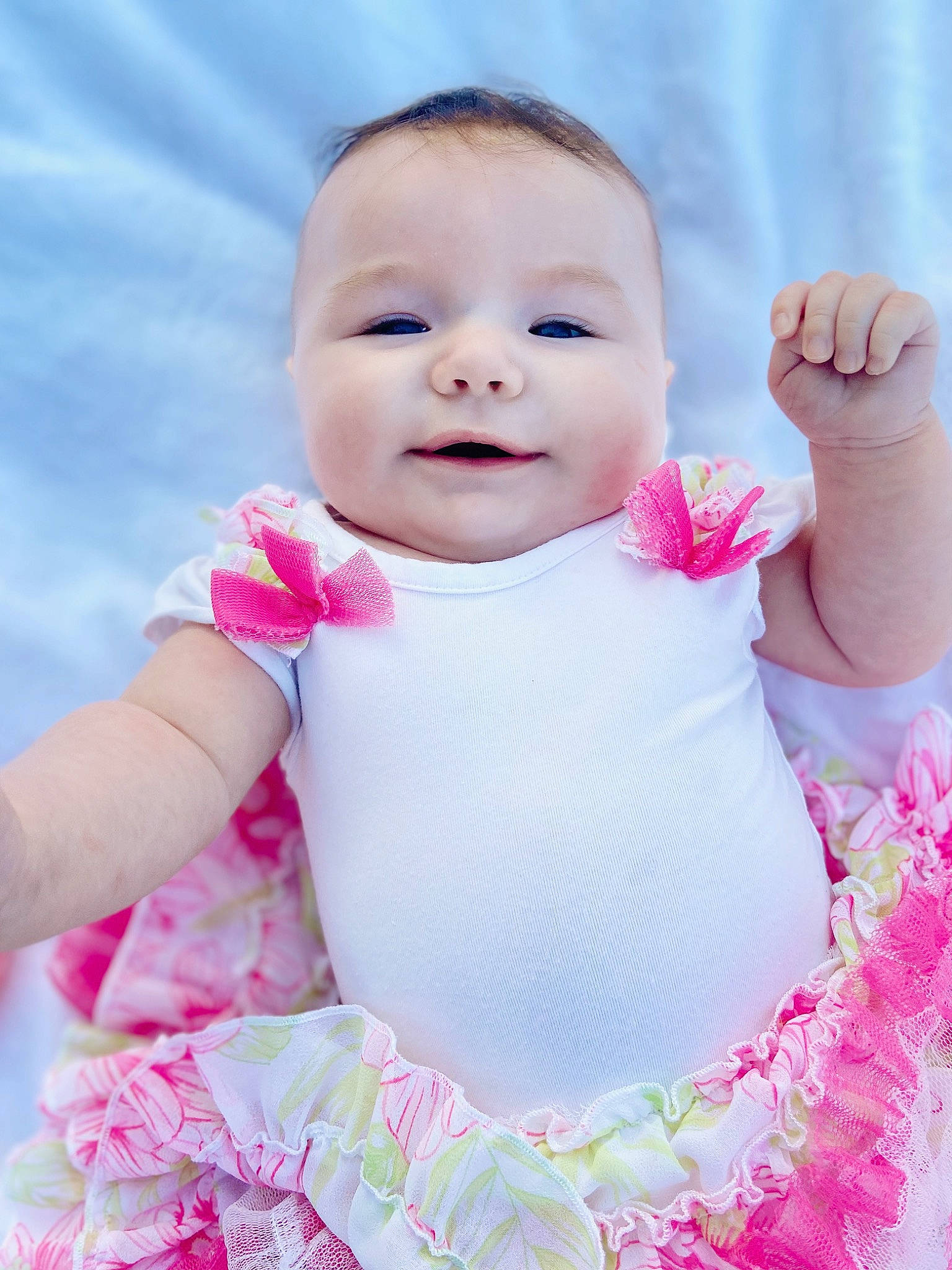 Laikyn is registered to the contest to win money with this photo: baby, baby_toddler_clothing, cheek, dress, finger, flash_photography, gesture, hairstyle, happy, lip, outerwear, person, pink, purple, skin, sleeve, smile, standing, textile, toddler