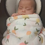 Alison joined the competition — help win amazing prizes! baby, baby_seat, blanket, calm, child, comfort, cushion, cute, fruit_pattern, indoors, infant, newborn, peaceful, portrait, resting, sleeping, soft, swaddle, wrapped, young