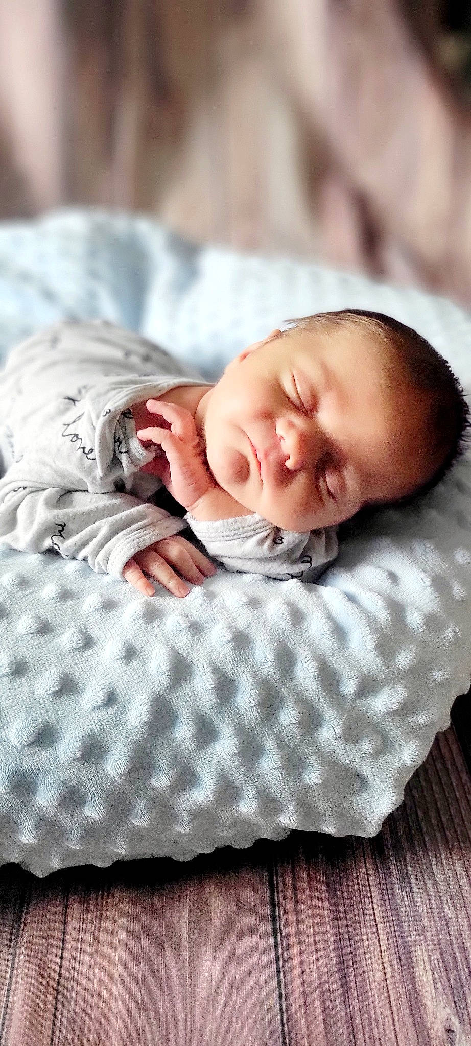 Jakobe is registered to the contest to win money with this photo: baby, baby_products, baby_sleeping, baby_toddler_clothing, bedding, bedtime, black, child, comfort, flooring, linens, pattern, person, portrait_photography, product, sleep, sleeve, textile, toddler