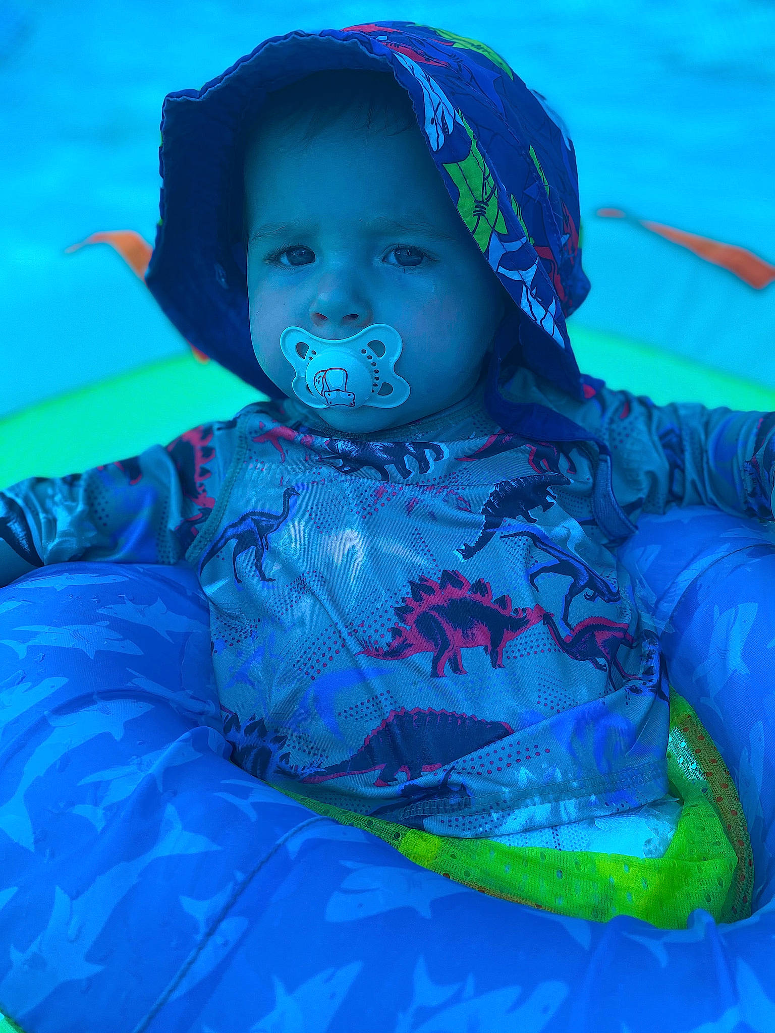 Collson is registered to the contest to win money with this photo: aqua, azure, baby, baby_toddler_clothing, blue, child, electric_blue, eye, flash_photography, fun, happy, hat, headgear, leisure, magenta, mouth, person, personal_protective_equipment, purple, sleeve