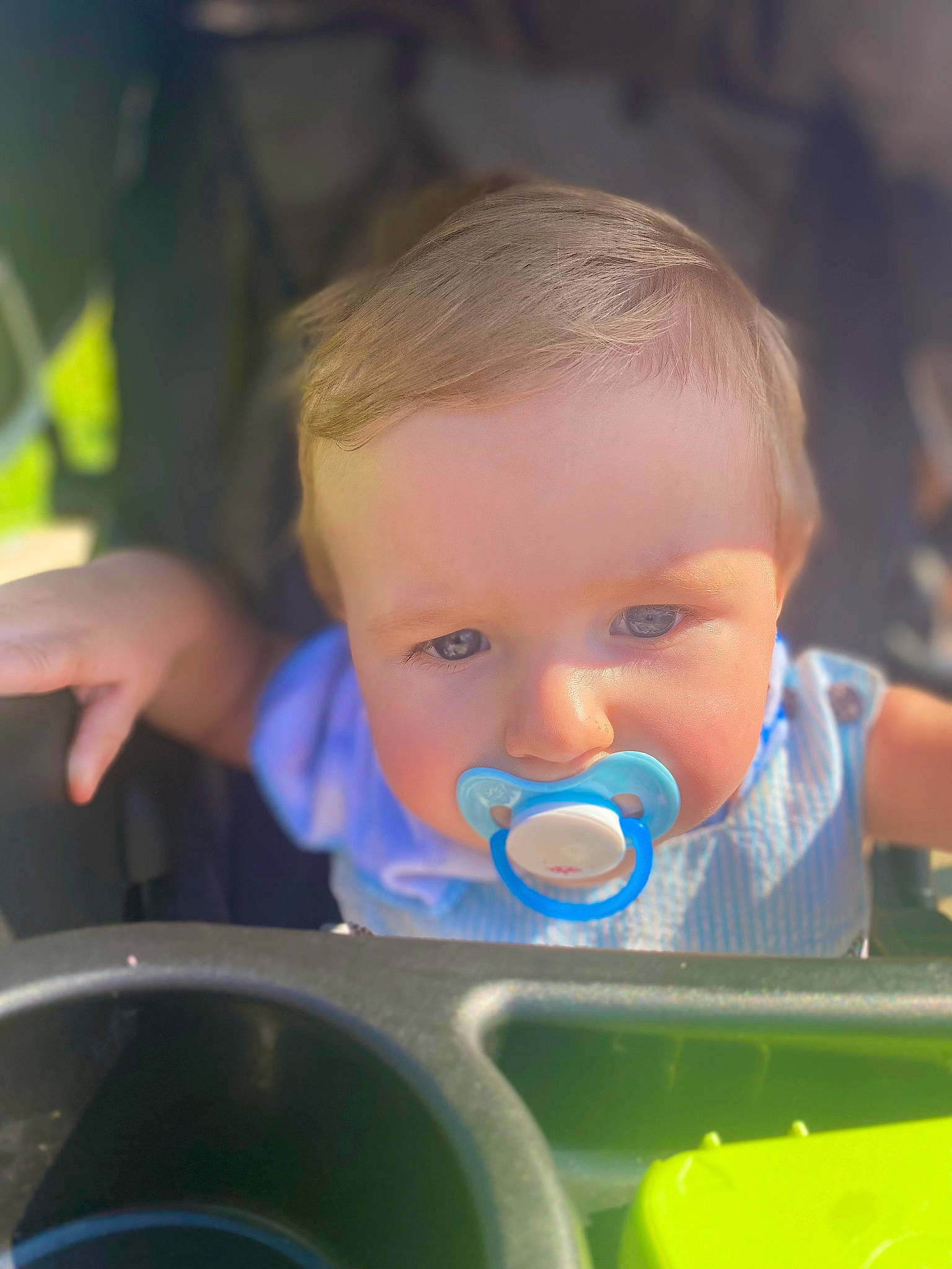 Collson is registered to the contest to win money with this photo: baby, baby_products, baby_toddler_clothing, cheek, child, electric_blue, facial_expression, fun, grass, happy, iris, leisure, mouth, nose, person, play, recreation, skin, toddler, tree