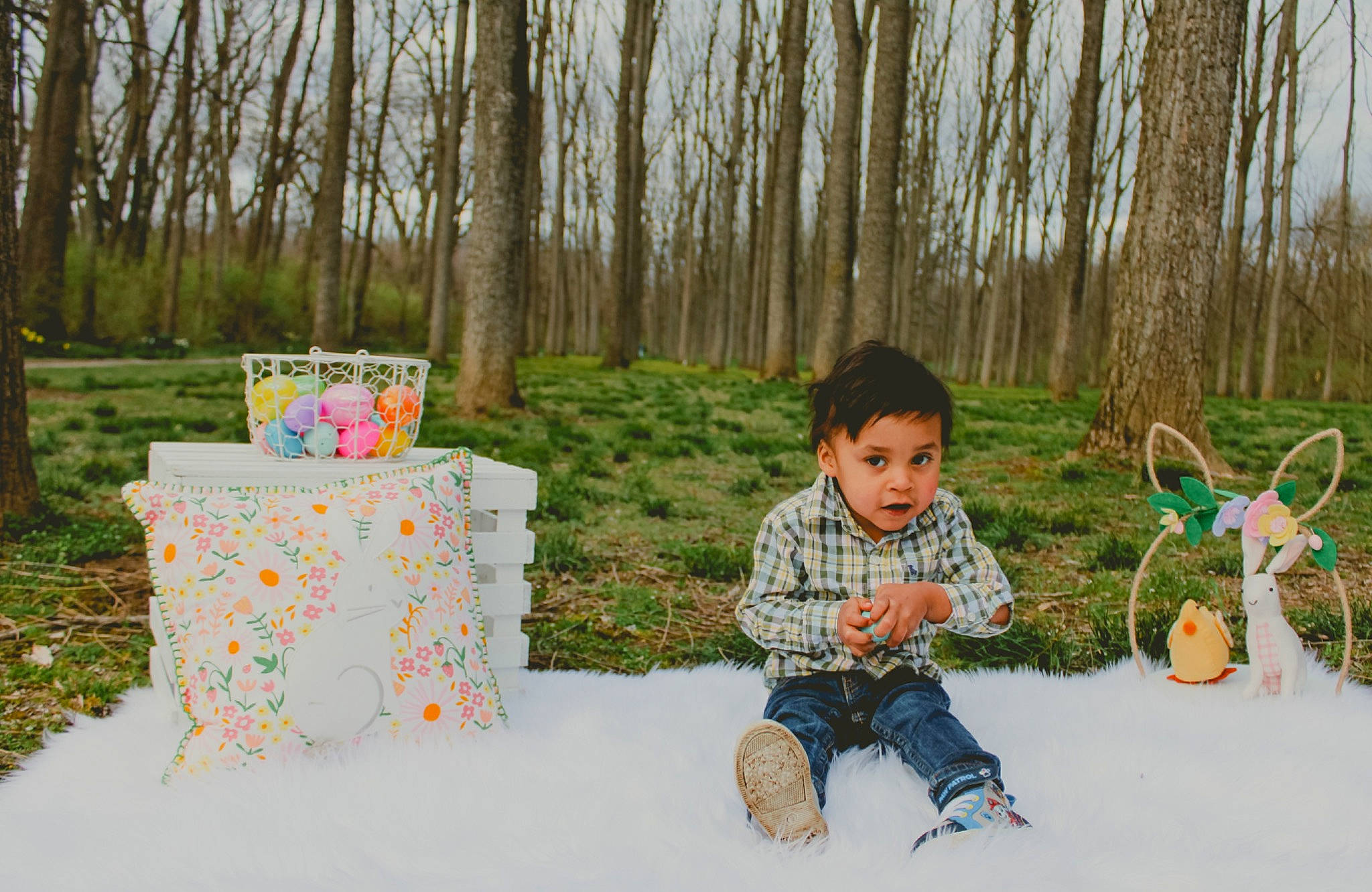 Malaki is registered to the contest to win money with this photo: baby, baby_toddler_clothing, chair, child, event, fun, garden, grass, happy, leisure, linens, people_in_nature, person, plant, recreation, sitting, table, toddler, toy, tree