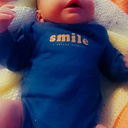 Angel joined the competition — help win amazing prizes! baby, infant, sleeping, onesie, clothing, blanket, knitted, multicolored, face, head, peaceful, cute, newborn, person, soft, cozy, resting, indoors, child, portrait