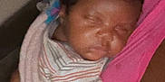 Nasiah is registered to the contest to win money with this photo: arm, baby, care, child, closeup, comfort, cozy, cuddle, face, indoors, infant, mitten, peaceful, person, rest, skin, sleeping, striped_cloth, tender, warmth
