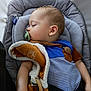 baby, sleeping, car_seat, pacifier, blanket, child, infant, clothing, seatbelt, comfort, peaceful, rest, cute, soft_toy, head, face, arm, indoors, portrait, relaxation