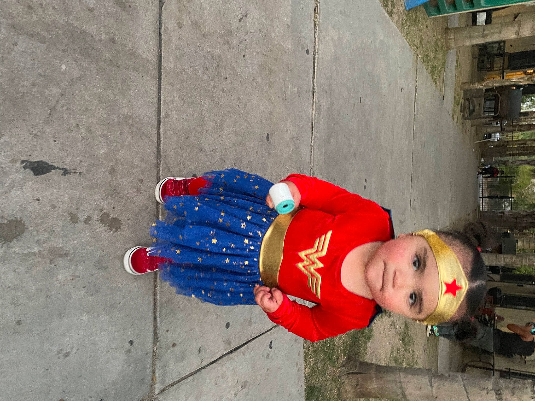 Clarissa joined the competition — help win amazing prizes! asphalt, carmine, child, concrete, costume, electric_blue, fictional_character, flooring, fun, hat, human_leg, leisure, person, plant, recreation, road_surface, sidewalk, toddler, tree, winter