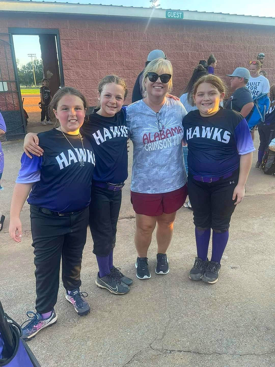 Makenzie is registered to the contest to win money with this photo: asphalt, baseball_cap, blue, competition_event, crew, electric_blue, event, eyewear, fun, goggles, hat, headwear, joy, leisure, person, recreation, shorts, smile, sunglasses, t_shirt