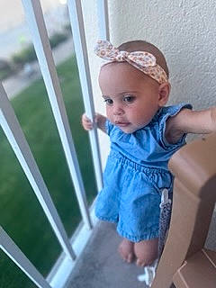 Emmy joined the competition — help win amazing prizes! baby, baby_products, baby_toddler_clothing, blond, child, day_dress, doll, dress, electric_blue, fashion_accessory, fence, headband, headpiece, jewellery, pattern, person, purple, sitting, sleeve, toddler