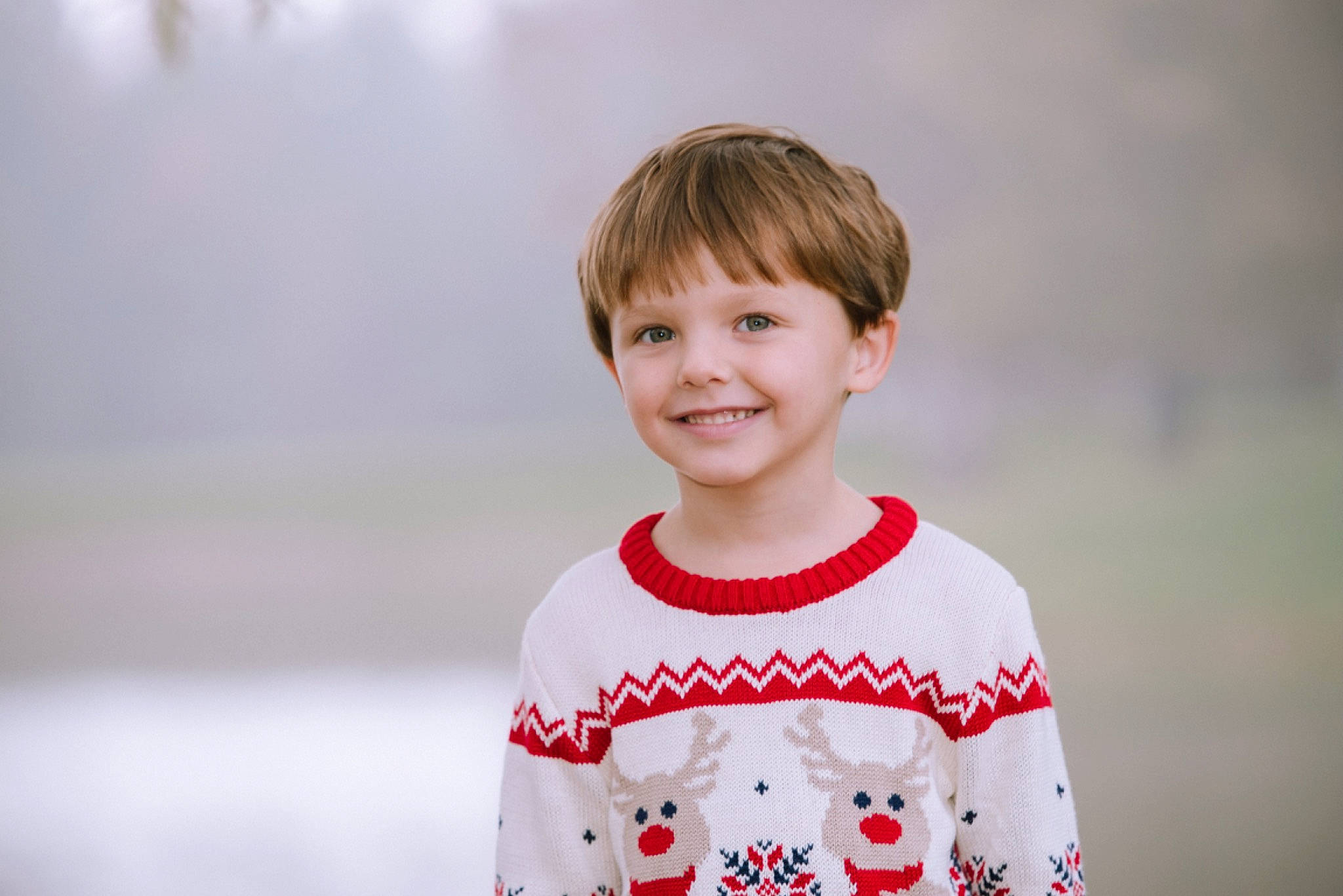 Luke is registered to the contest to win money with this photo: baby_toddler_clothing, bangs, brown_hair, cheek, child, child_model, clothing, crop, eyelash, iris, joy, long_sleeved_t_shirt, person, pleased, portrait, portrait_photography, sleeve, sports_jersey, sweater