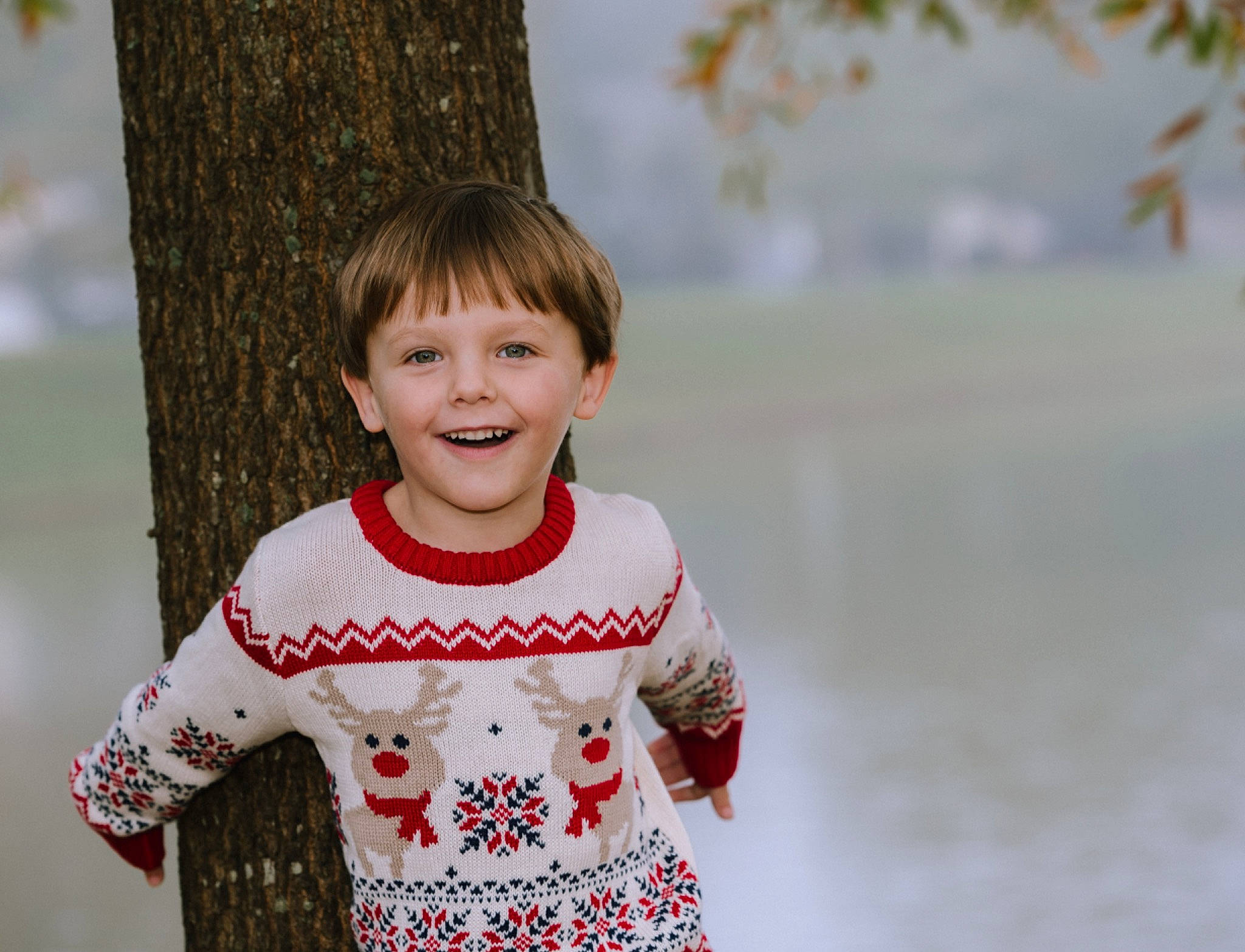 Luke is registered to the contest to win money with this photo: baby_toddler_clothing, child_model, embellishment, hair, happy, joy, laugh, long_sleeved_t_shirt, mouth, pattern, person, portrait_photography, sleeve, spring, tooth, trunk