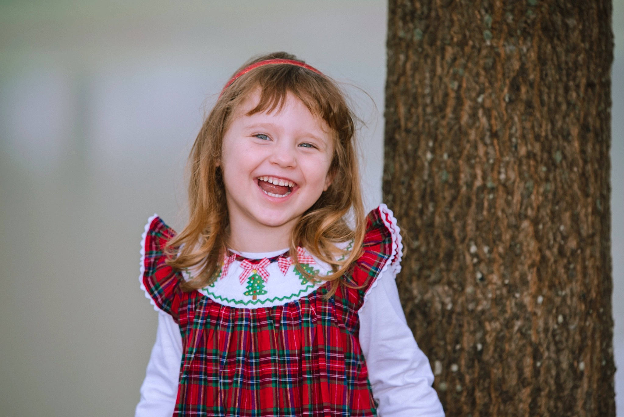 Lauren is registered to the contest to win money with this photo: baby_toddler_clothing, bangs, blond, brown_hair, child_model, facial_expression, feathered_hair, hairstyle, happy, iris, joy, laugh, lip, long_hair, organ, pattern, person, plaid, sleeve, tartan