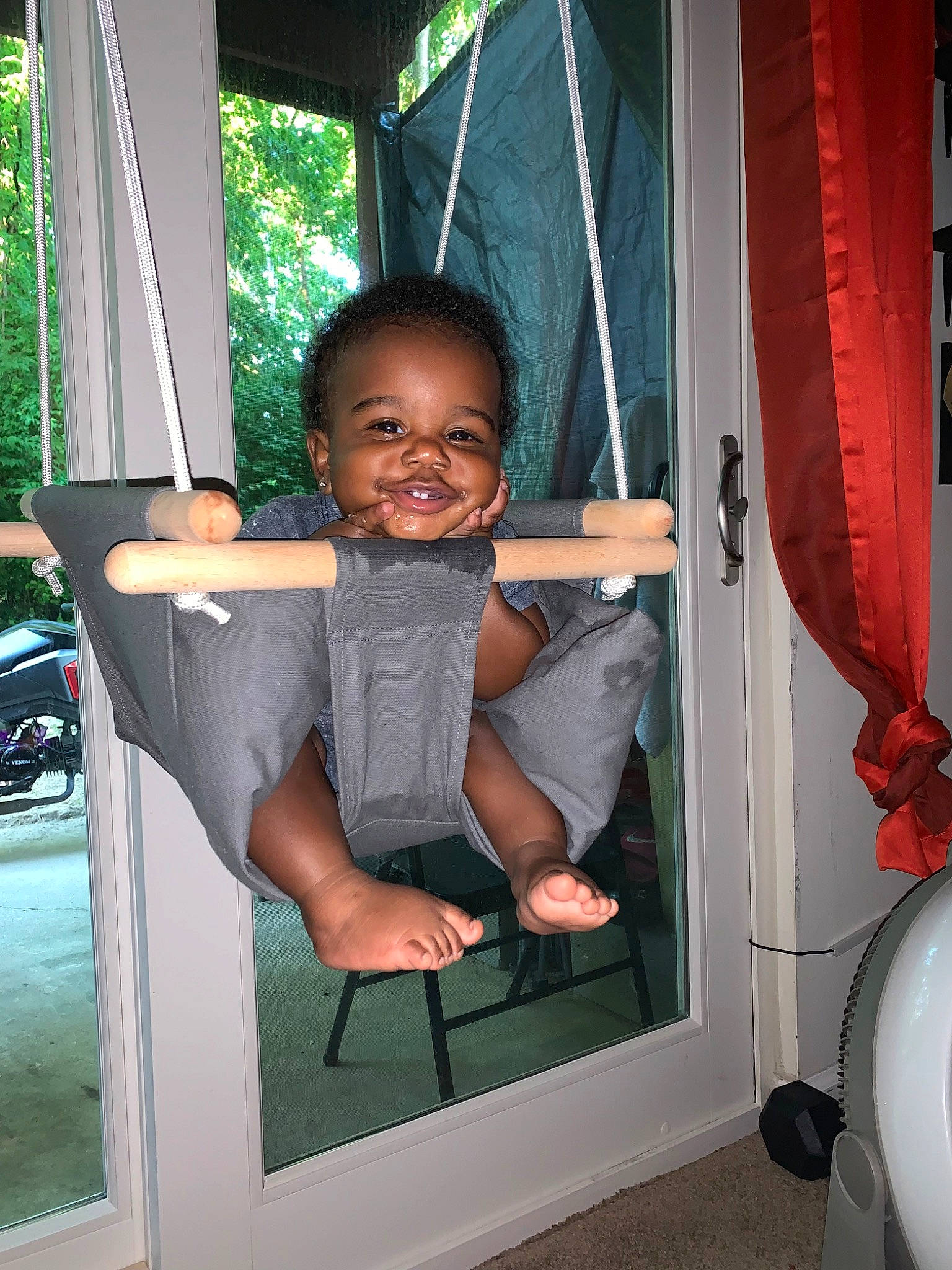 Darius joined the competition — help win amazing prizes! baby_toddler_clothing, chair, child, door, dress, fun, happy, house, leisure, person, room, shorts, smile, standing, t_shirt, thumb, tire, toddler, tree, wheel