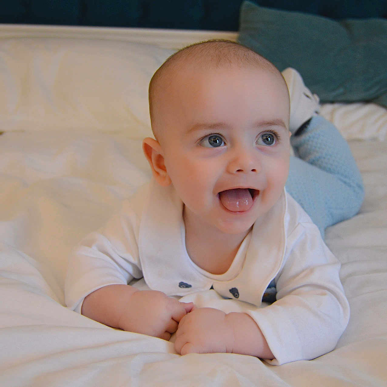 Noah joined the competition — help win amazing prizes! baby, babylaughing, bed, bedroom, bodypart, couch, cushion, face, finger, furniture, hand, happy, head, homedecor, indoors, person, photography, portrait, room, smile