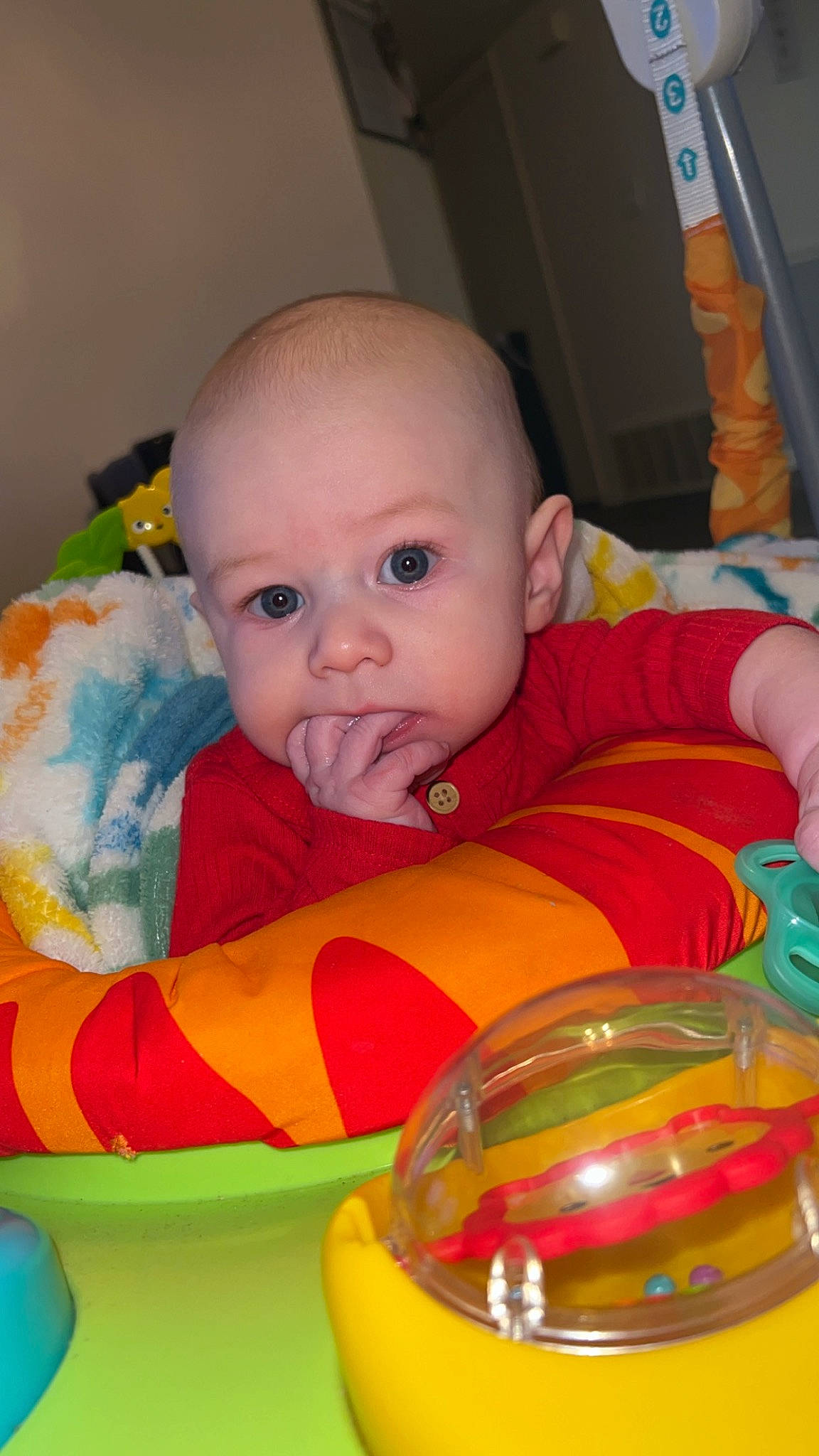 Zayden is registered to the contest to win money with this photo: baby, baby_products, baby_toddler_clothing, baby_toys, bib, cheek, child, chin, drinkware, eye, eyebrow, fun, head, iris, mouth, nose, orange, person, sitting, skin