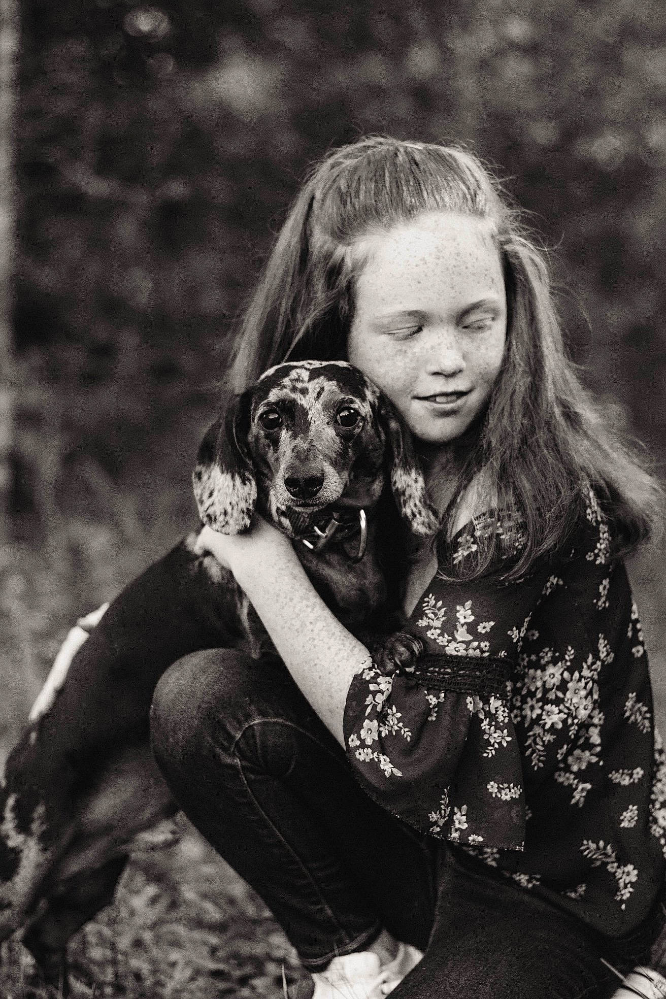 Zero is registered to the contest to win money with this photo: black, black_and_white, brown_hair, carnivore, child, companion_dog, dog, dog_breed, fawn, flash_photography, fur, grass, happy, long_hair, monochrome, monochrome_photography, people_in_nature, smile, style, white