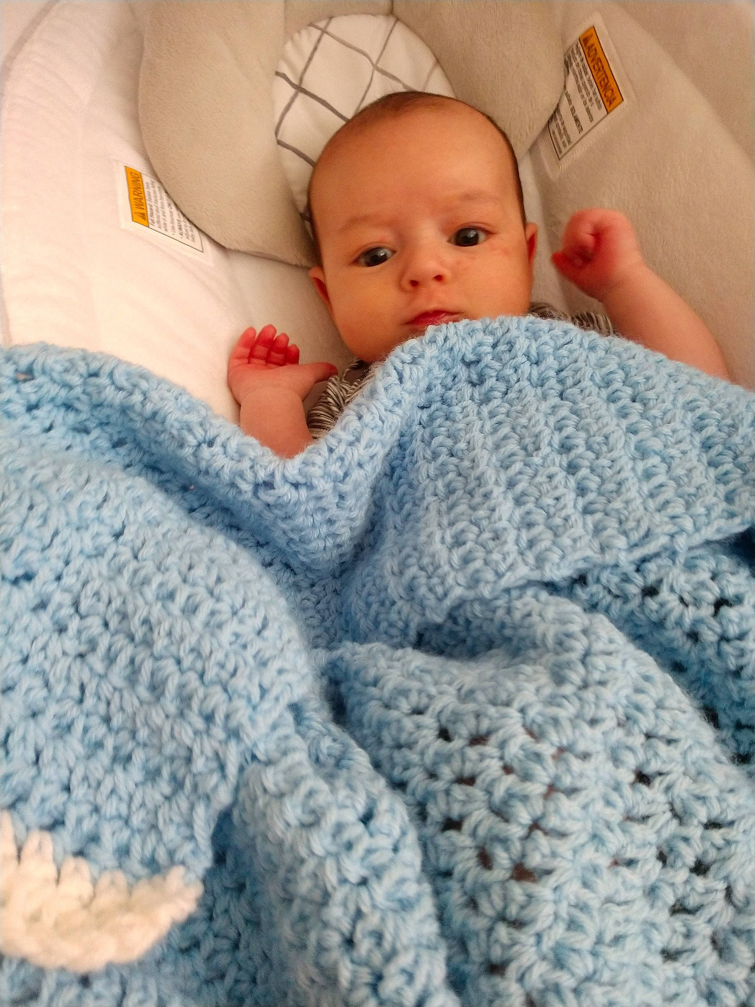 Maxwell joined the competition — help win amazing prizes! art, baby, baby_sleeping, bedding, bedtime, blanket, cheek, child, crochet, eye, knitting, linens, nose, person, product, skin, sleep, textile, toddler, wool