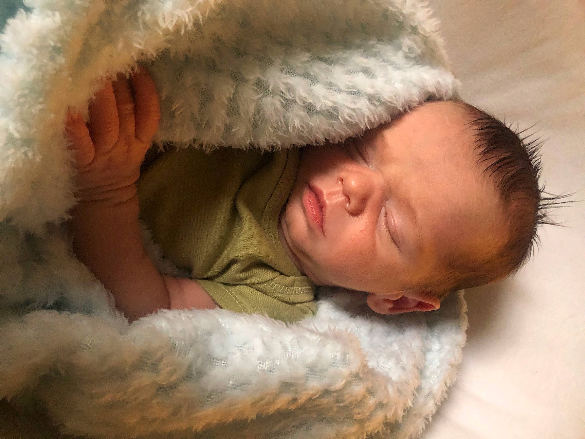 Rogan joined the competition — help win amazing prizes! baby, baby_sleeping, bed, bedtime, child, close_up, comfort, eye, fur, fur_clothing, gesture, linens, nap, nose, person, room, skin, sleep, toddler, wood