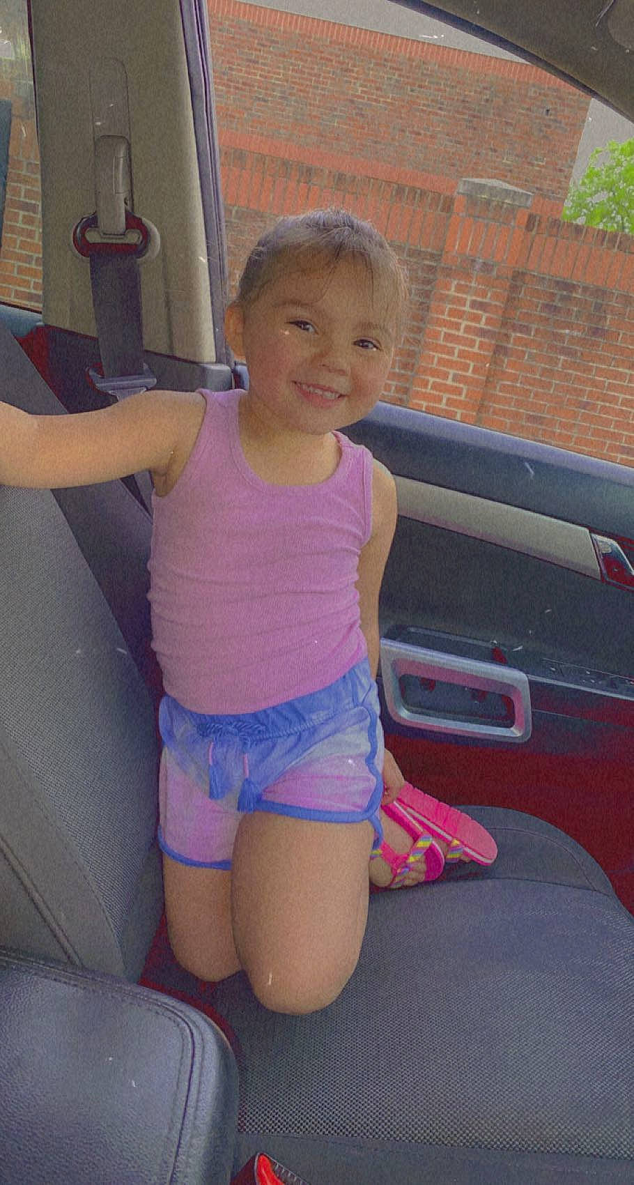 Ava joined the competition — help win amazing prizes! automotive_exterior, electric_blue, happy, human_leg, joint, joy, knee, leg, leisure, magenta, motor_vehicle, person, pink, shorts, smile, summer, thigh, toddler, trunk, vehicle_door