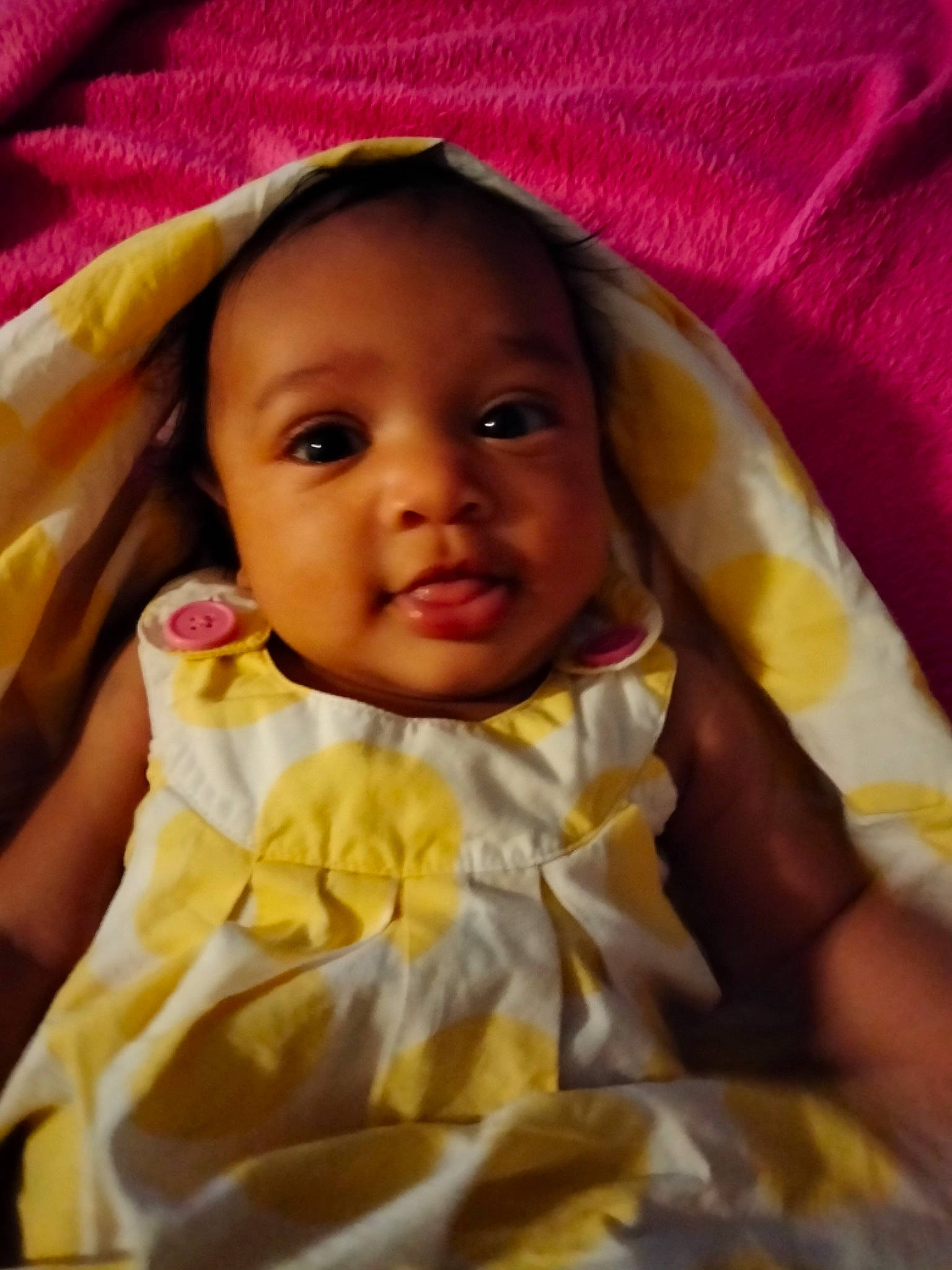 Kimiko is registered to the contest to win money with this photo: baby, cheek, child, chin, comfort, dress, eye, eyebrow, happy, head, iris, linens, lip, nose, outerwear, person, pink, skin, smile, textile