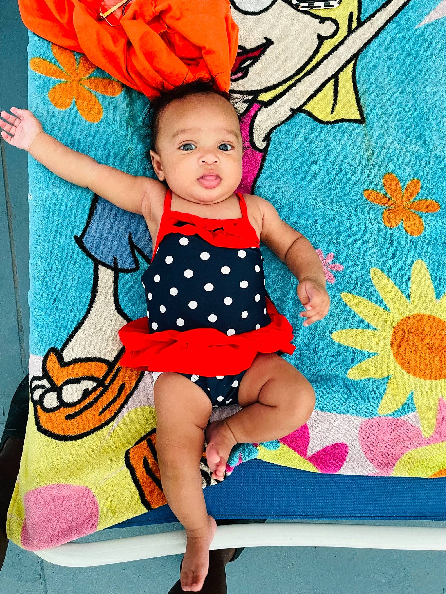 Kimiko is registered to the contest to win money with this photo: aqua, arm, baby, baby_toddler_clothing, child, dress, facial_expression, fun, happy, human_body, leg, magenta, one_piece_garment, pattern, person, pink, sleeve, textile, thigh, toddler