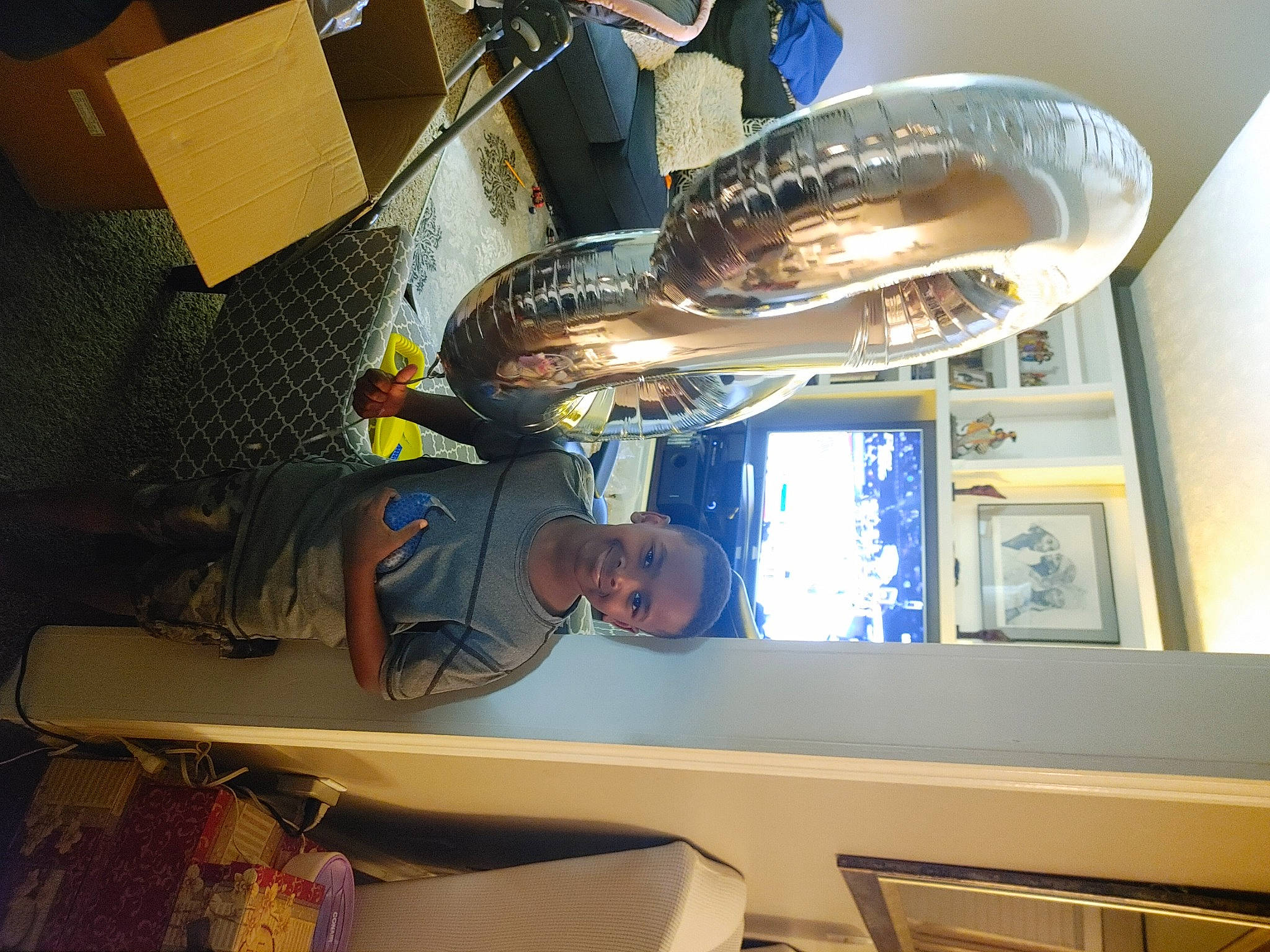 Alexander is registered to the contest to win money with this photo: brass_instrument, building, ceiling, engineering, food, fun, hat, joy, kitchen_utensil, light, lighting, machine, metal, person, personal_protective_equipment, plate, platter, room, space, steel