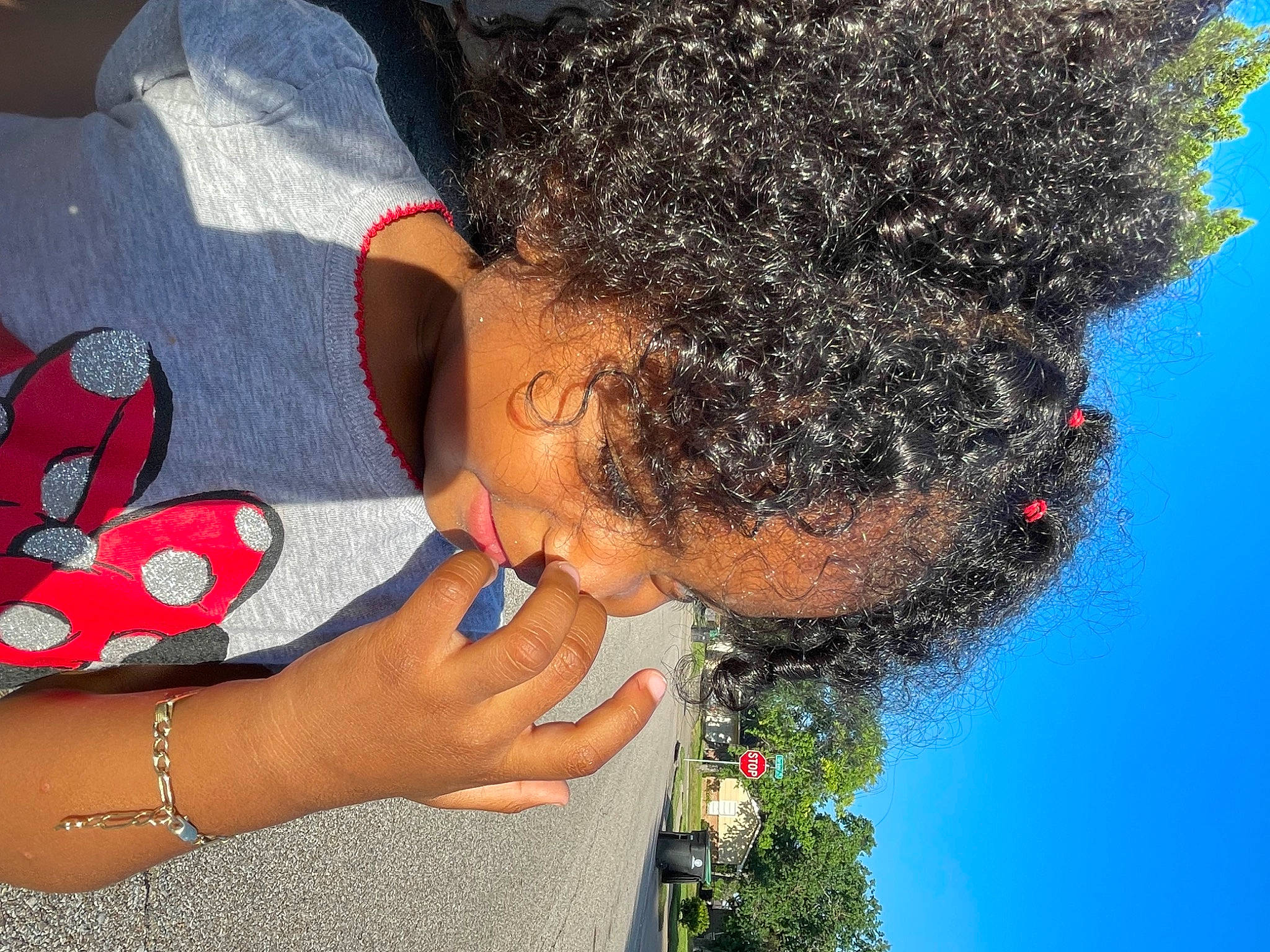 Melody is registered to the contest to win money with this photo: afro, black_hair, child, cool, earrings, electric_blue, event, fun, gesture, hairstyle, happy, jewellery, jheri_curl, leisure, nail, people_in_nature, person, plant, red, tree