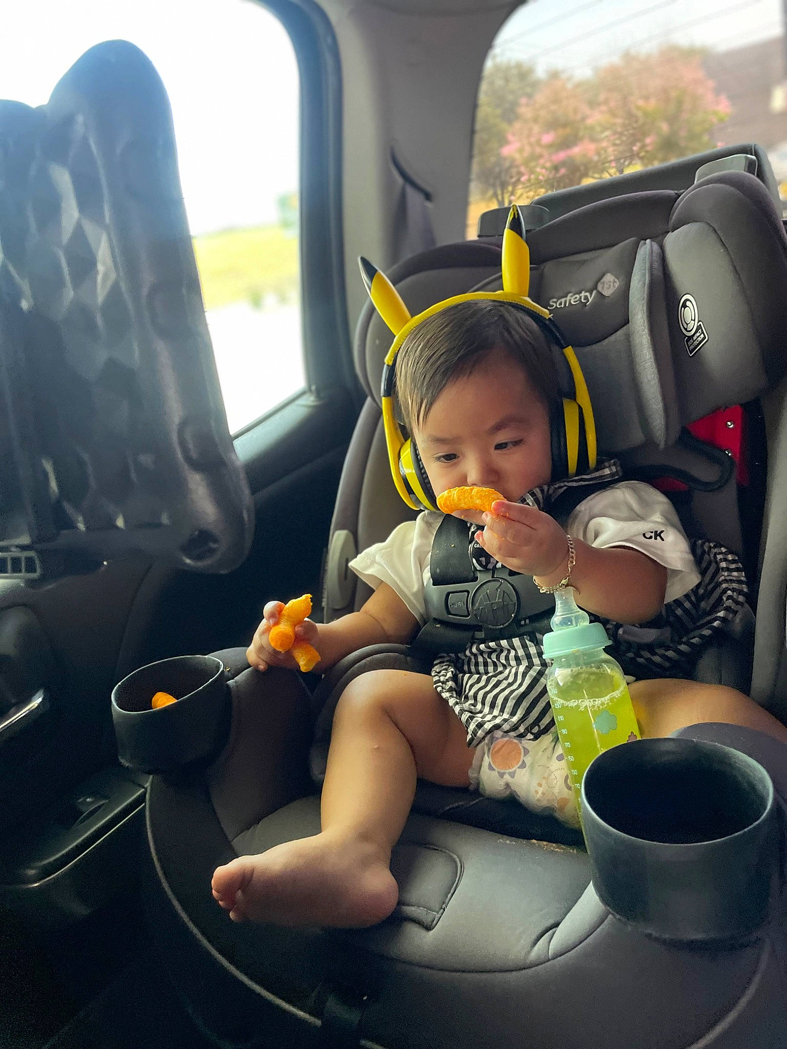 Junior joined the competition — help win amazing prizes! auto_part, automotive_design, baby, baby_carriage, baby_in_car_seat, car, car_seat, car_seat_cover, child, comfort, fun, head_restraint, motor_vehicle, person, plant, seat_belt, toddler, vehicle, vehicle_door, window
