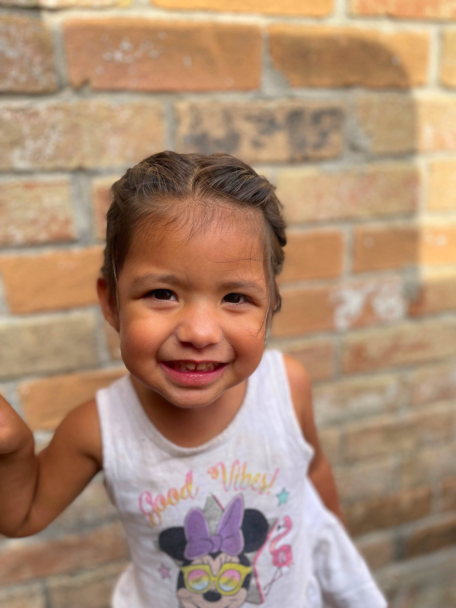 Isabella joined the competition — help win amazing prizes! baby_toddler_clothing, brick, brickwork, cheek, chin, eye, eyebrow, face, forehead, hair, happy, head, joy, mammal, neck, nose, person, shoulder, skin, sleeve