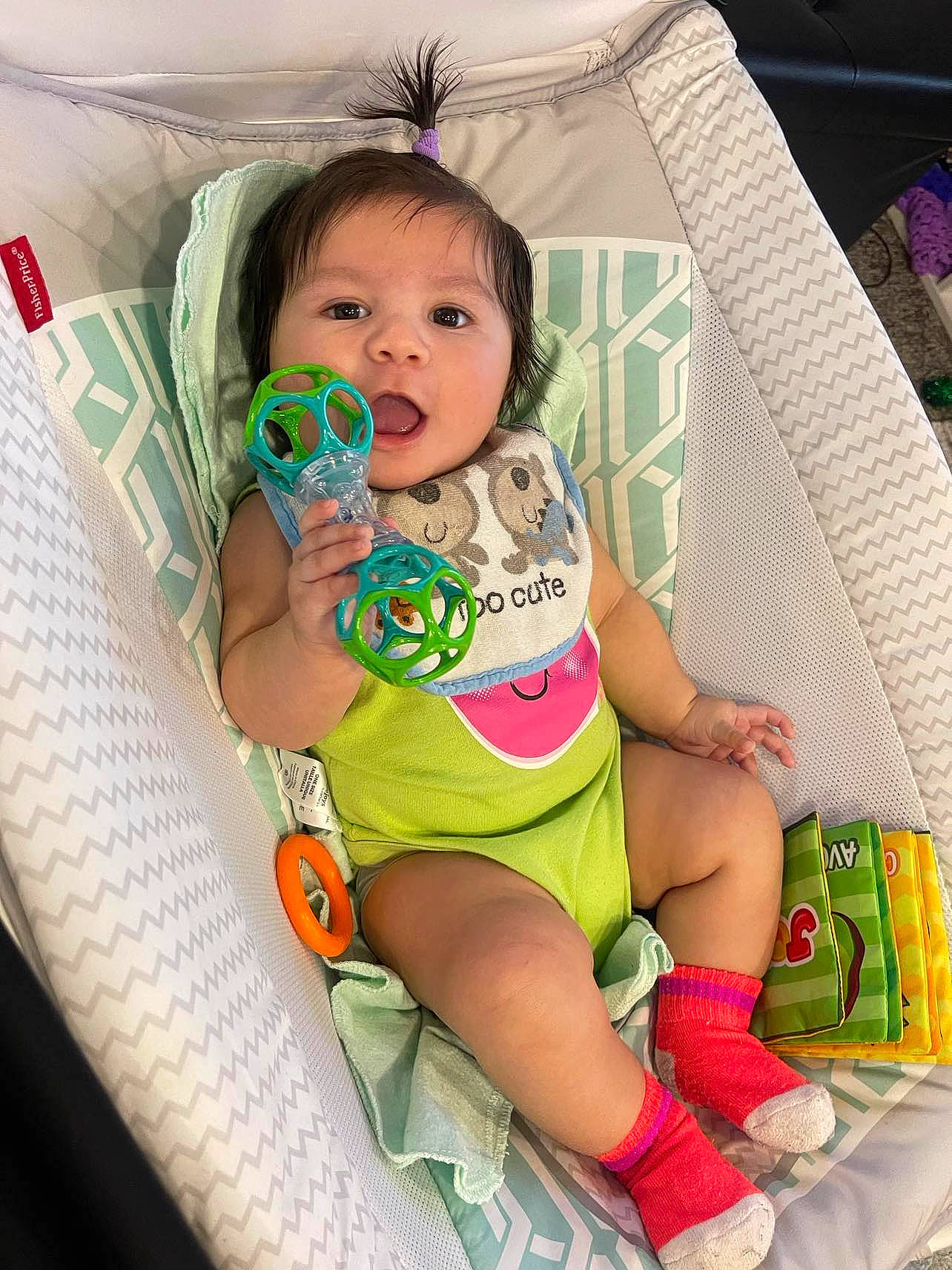 Ember is registered to the contest to win money with this photo: baby, baby_products, baby_safety, baby_toddler_clothing, child, comfort, diaper, finger, fun, happy, human_leg, knee, linens, mouth, pattern, person, product, sitting, skin, thigh