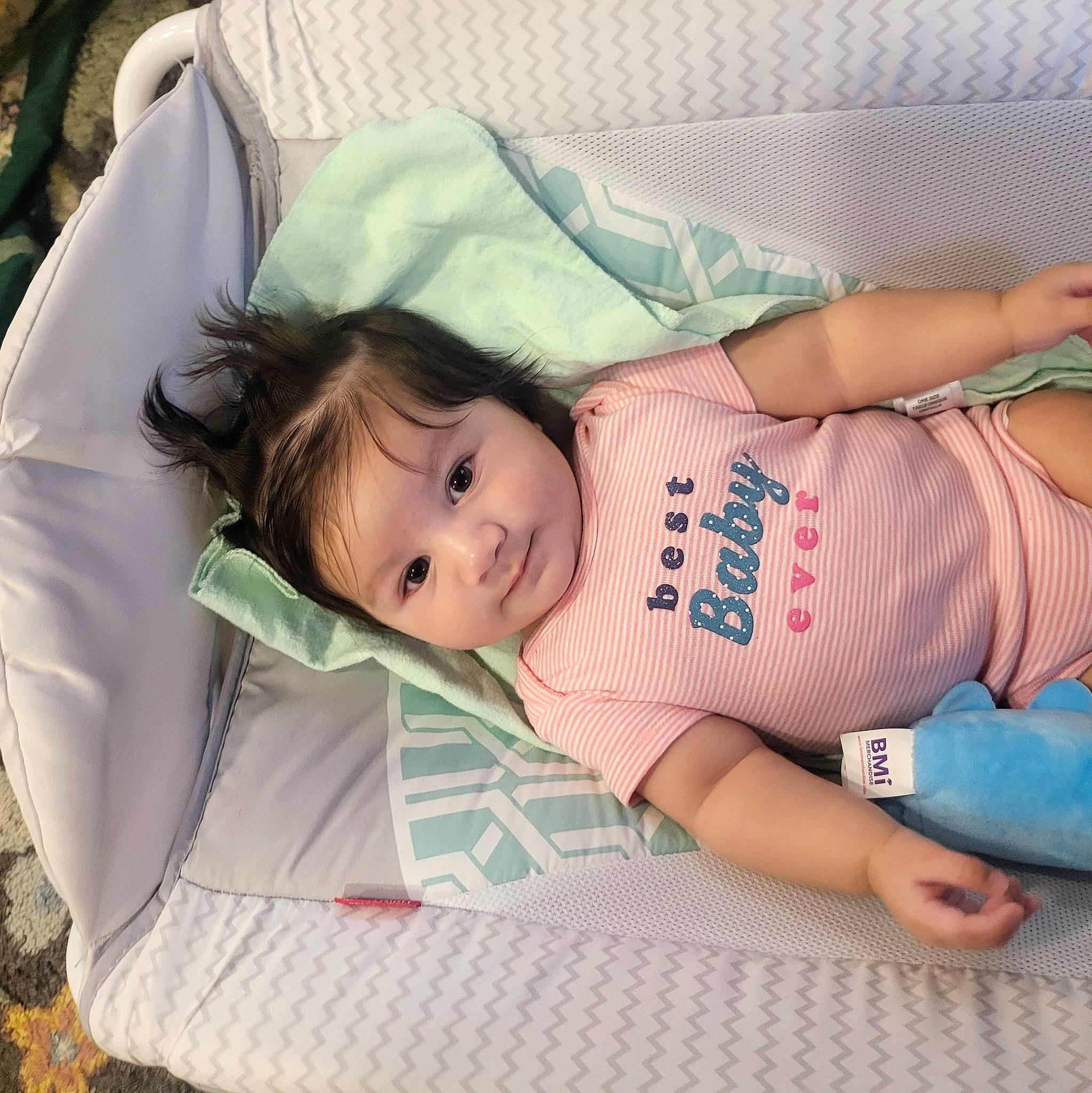 Ember joined the competition — help win amazing prizes! baby, baby_products, baby_toddler_clothing, child, comfort, grass, happy, human_leg, lap, leisure, linens, nap, pattern, person, sitting, skin, sleep, smile, thigh, toddler