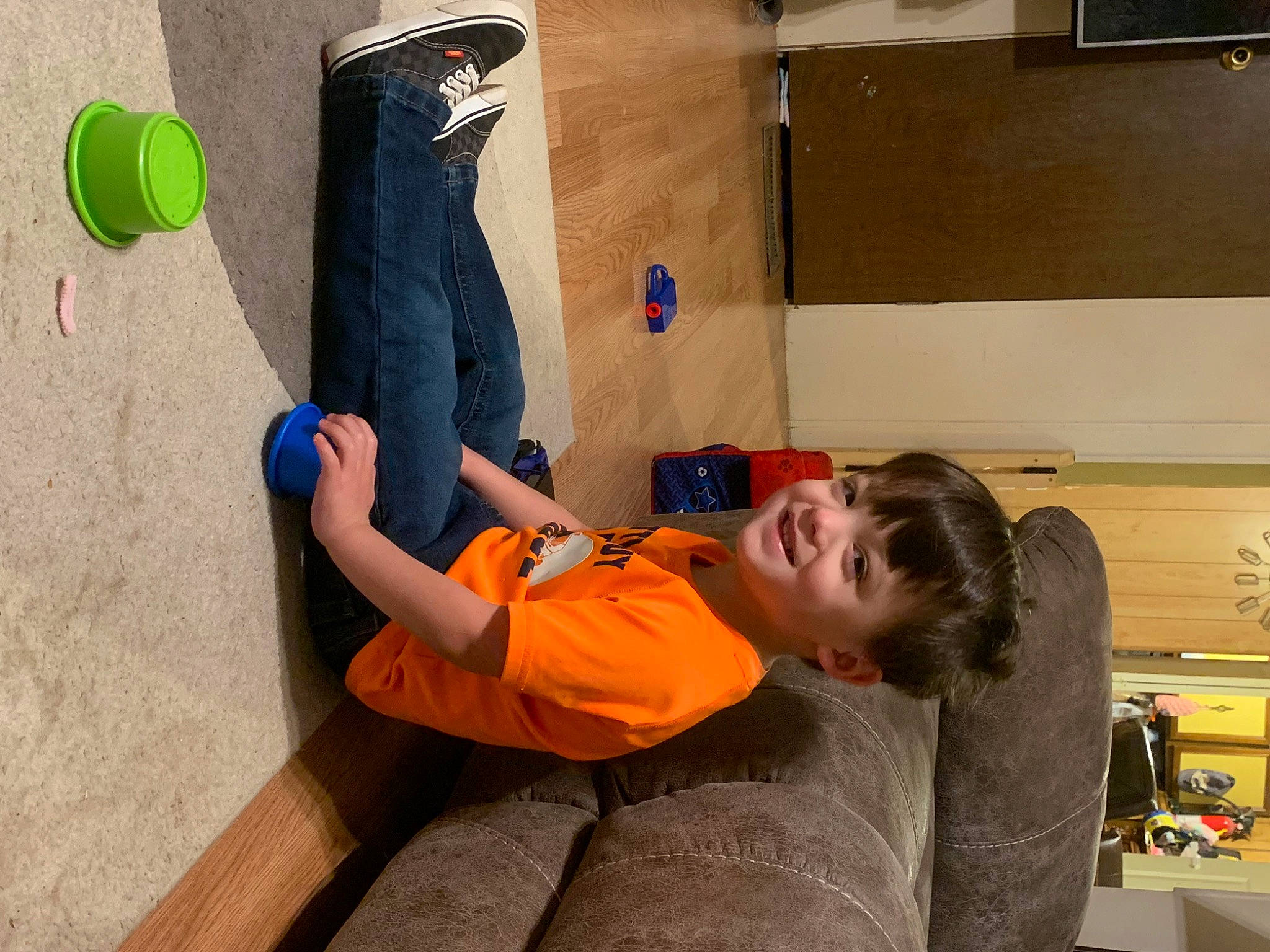 Kellin is registered to the contest to win money with this photo: adventure, bouldering, child, climbing, comfort, elbow, fun, human_leg, joint, joy, knee, leisure, person, recreation, room, shorts, sitting, sport_climbing, sports, t_shirt