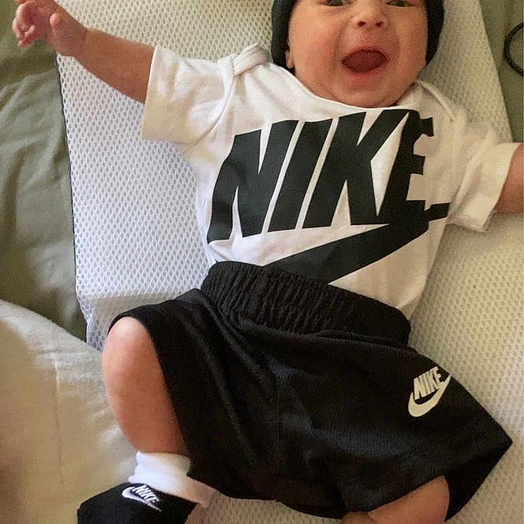 Colten joined the competition — help win amazing prizes! baby, clothing, couch, cushion, face, footwear, furniture, hat, head, helmet, homedecor, hosiery, pants, person, photography, portrait, shoe, shorts, sock, t_shirt