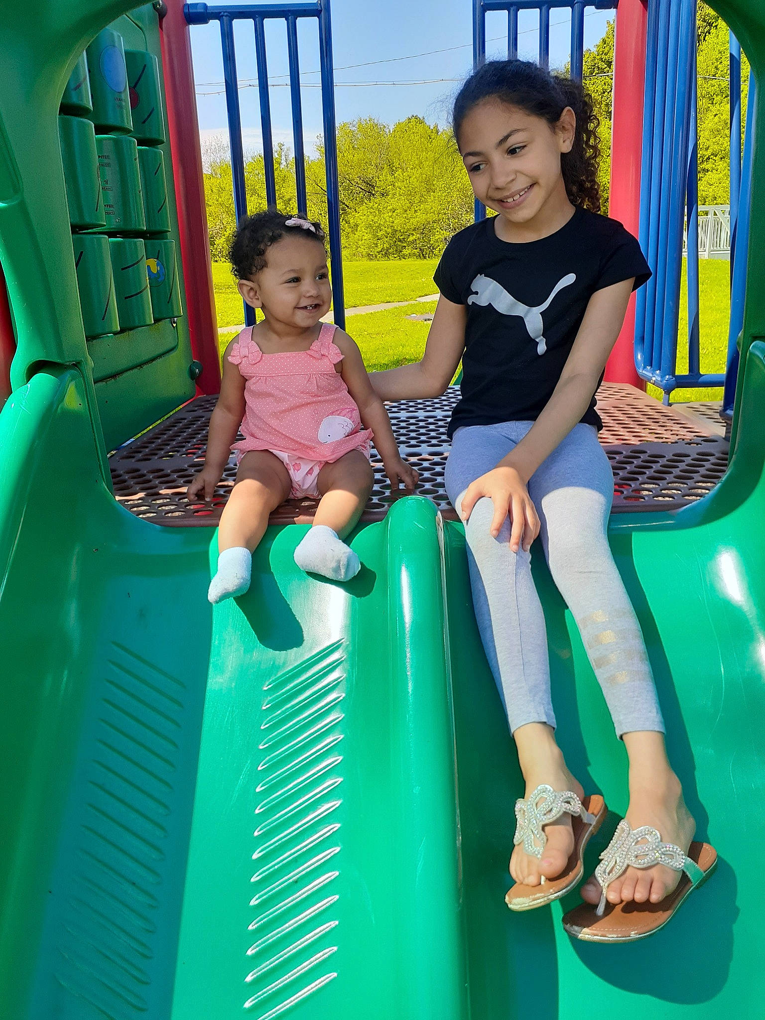 Katalena is registered to the contest to win money with this photo: aqua, blue, child, chute, fun, games, green, happy, joy, leisure, outdoor_play_equipment, person, play, playground, playground_slide, public_space, recreation, smile, summer, toddler