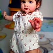 Anastasia joined the competition — help win amazing prizes! toddler, baby, child, crawling, onesie, floral_pattern, indoor, carpet, curious, young_child, person, furniture, soft_lighting, cute, small_hands, kneeling, expression, room, floor, earrings